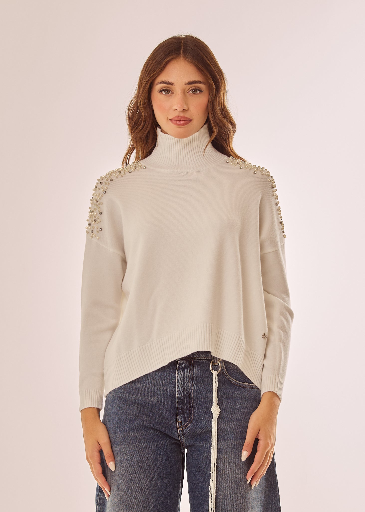 Maglia dolcevita con applicazioni