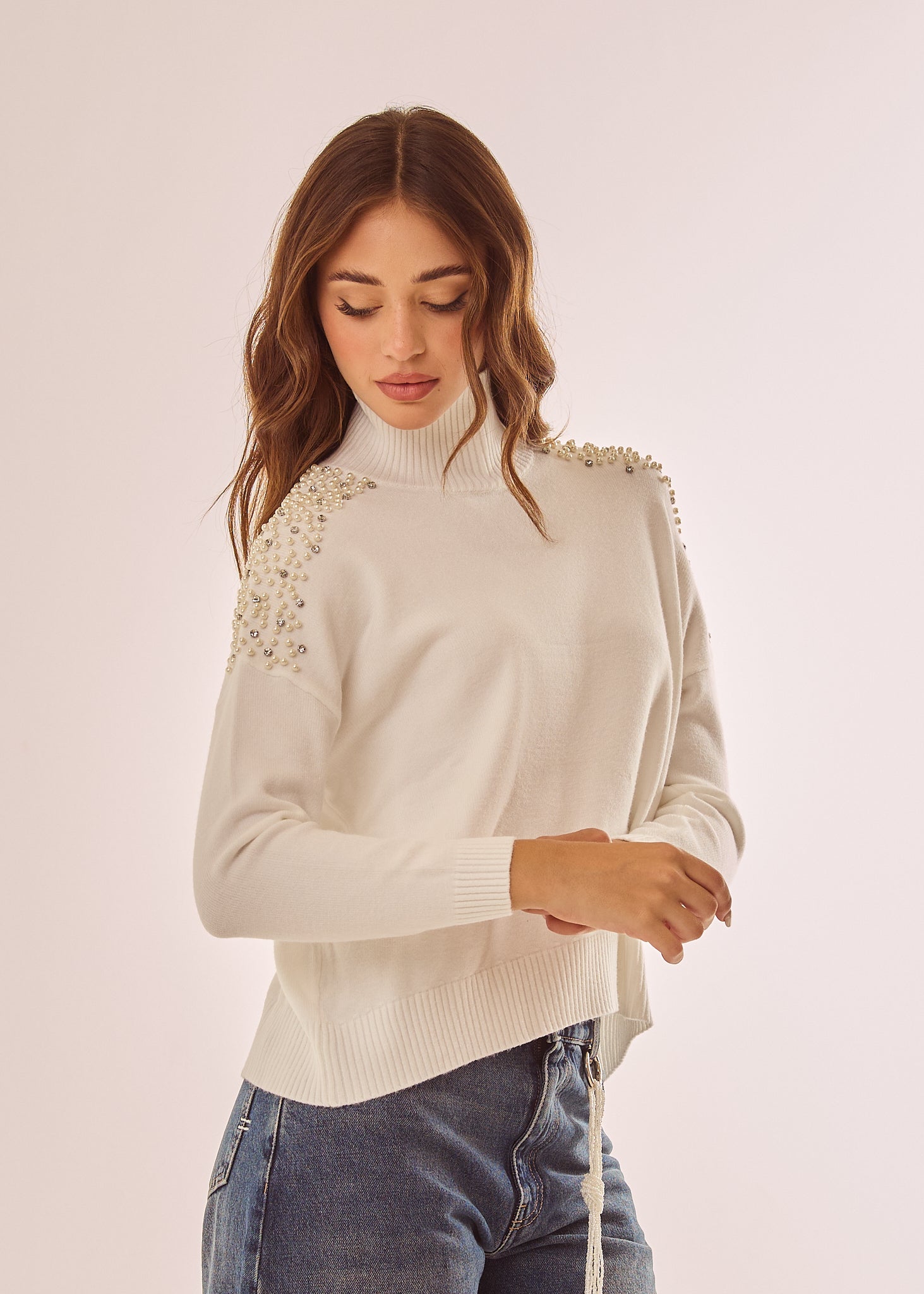 Maglia dolcevita con applicazioni