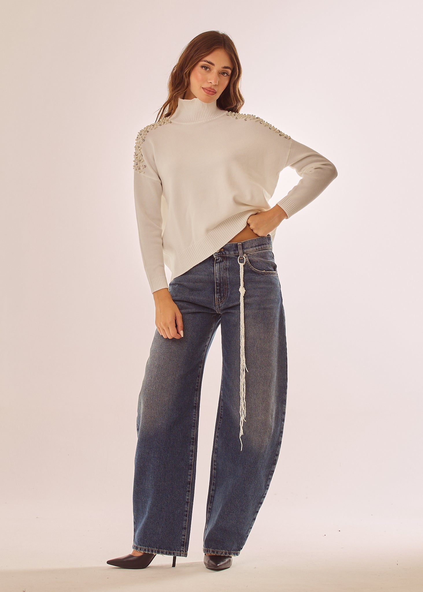 Maglia dolcevita con applicazioni