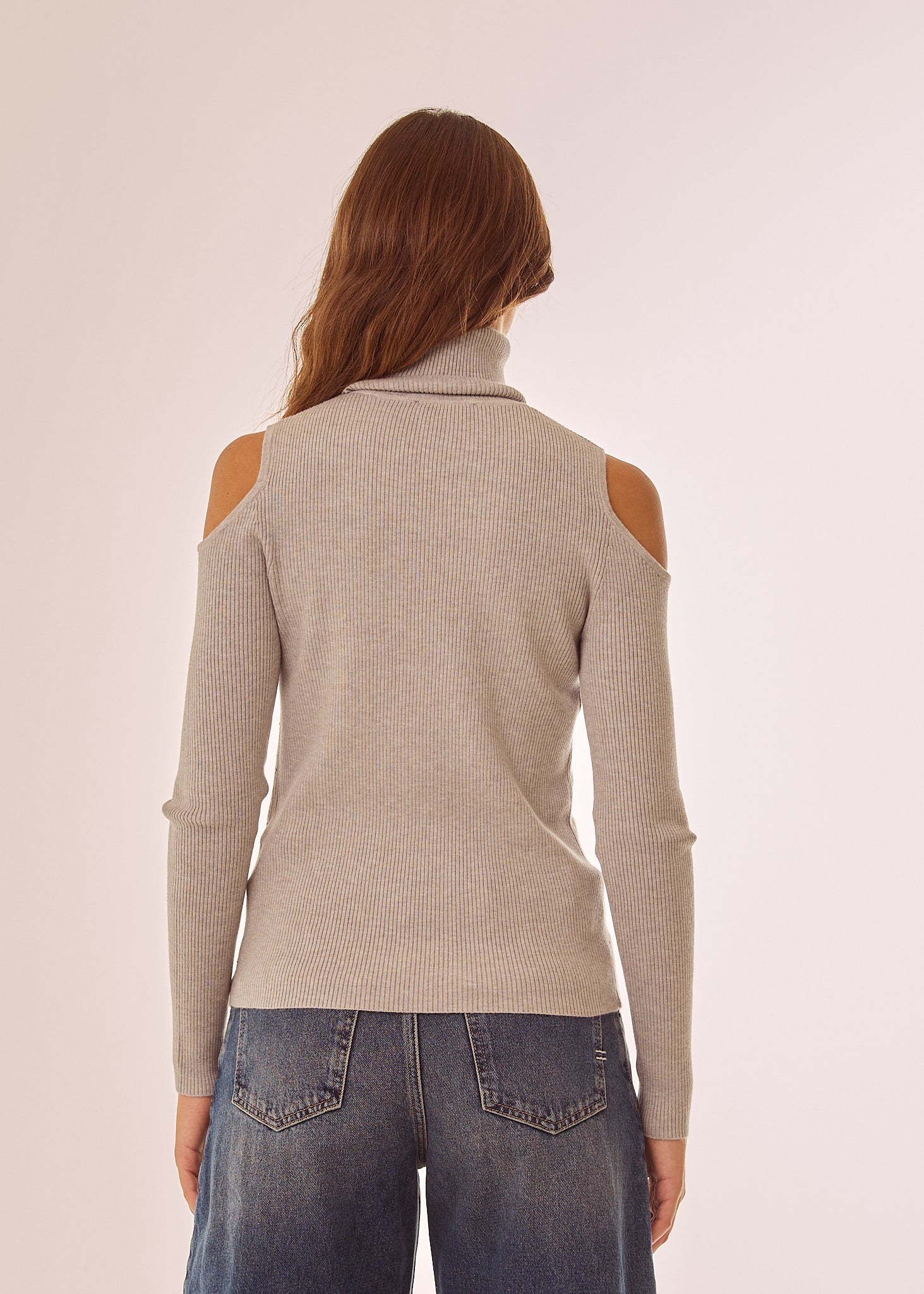 Maglia dolcevita con applicazioni