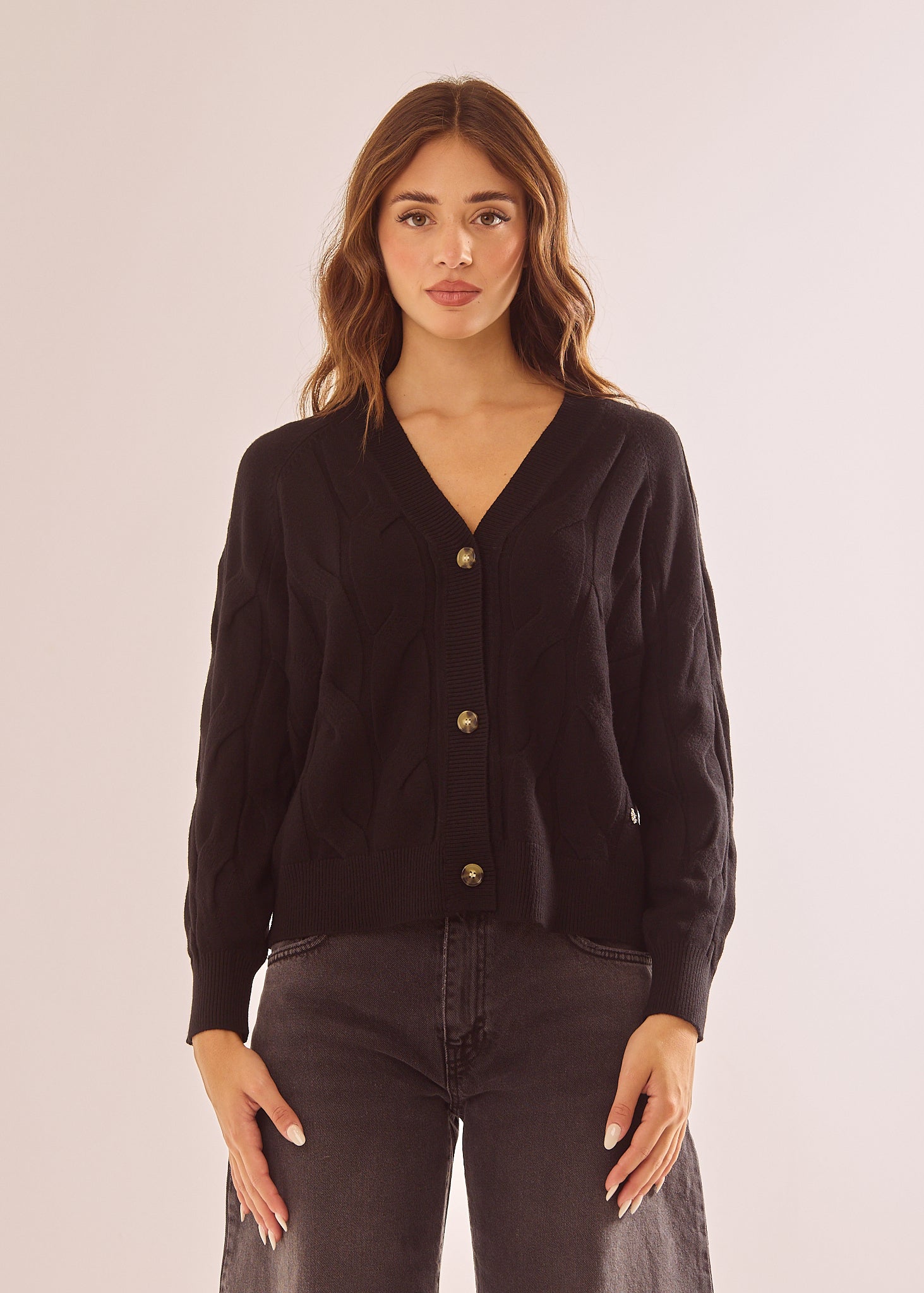 Cardigan con lavorazione a trecce