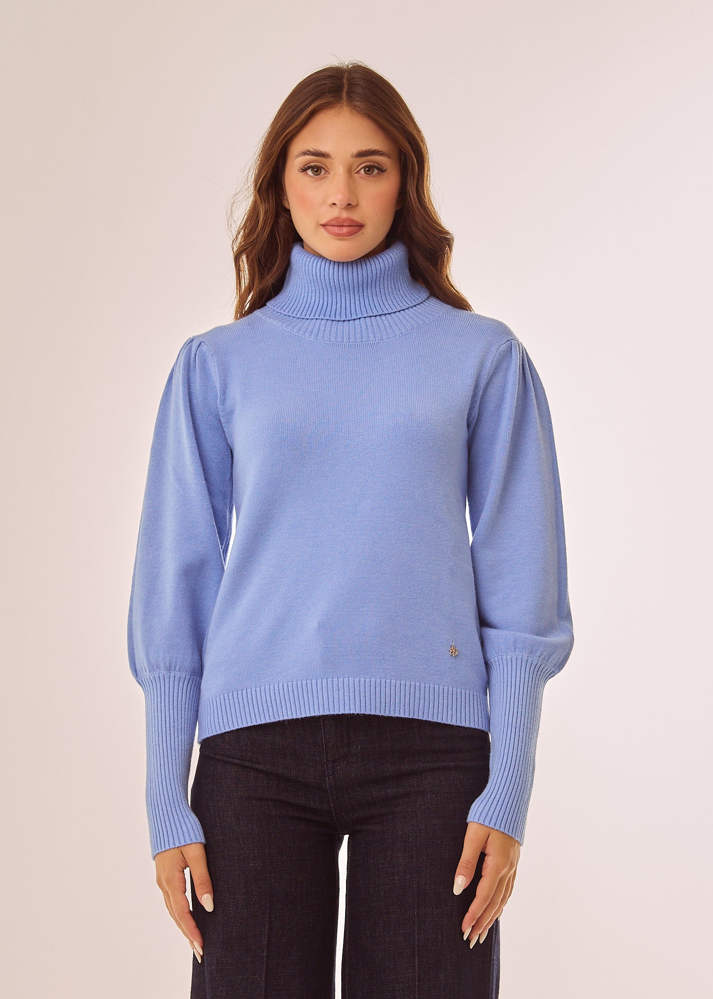 Maglia dolcevita con maniche lunghe a sbuffo