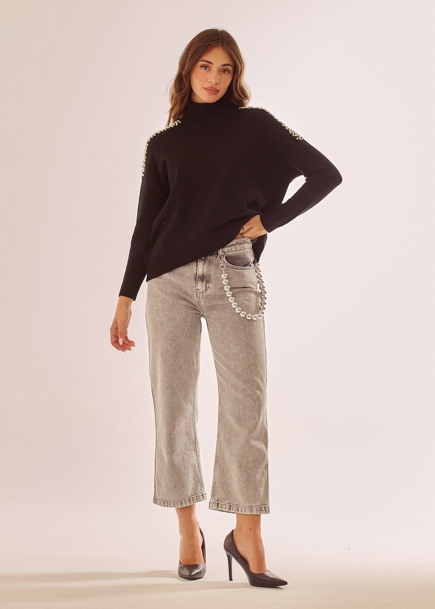 Maglia dolcevita con applicazioni