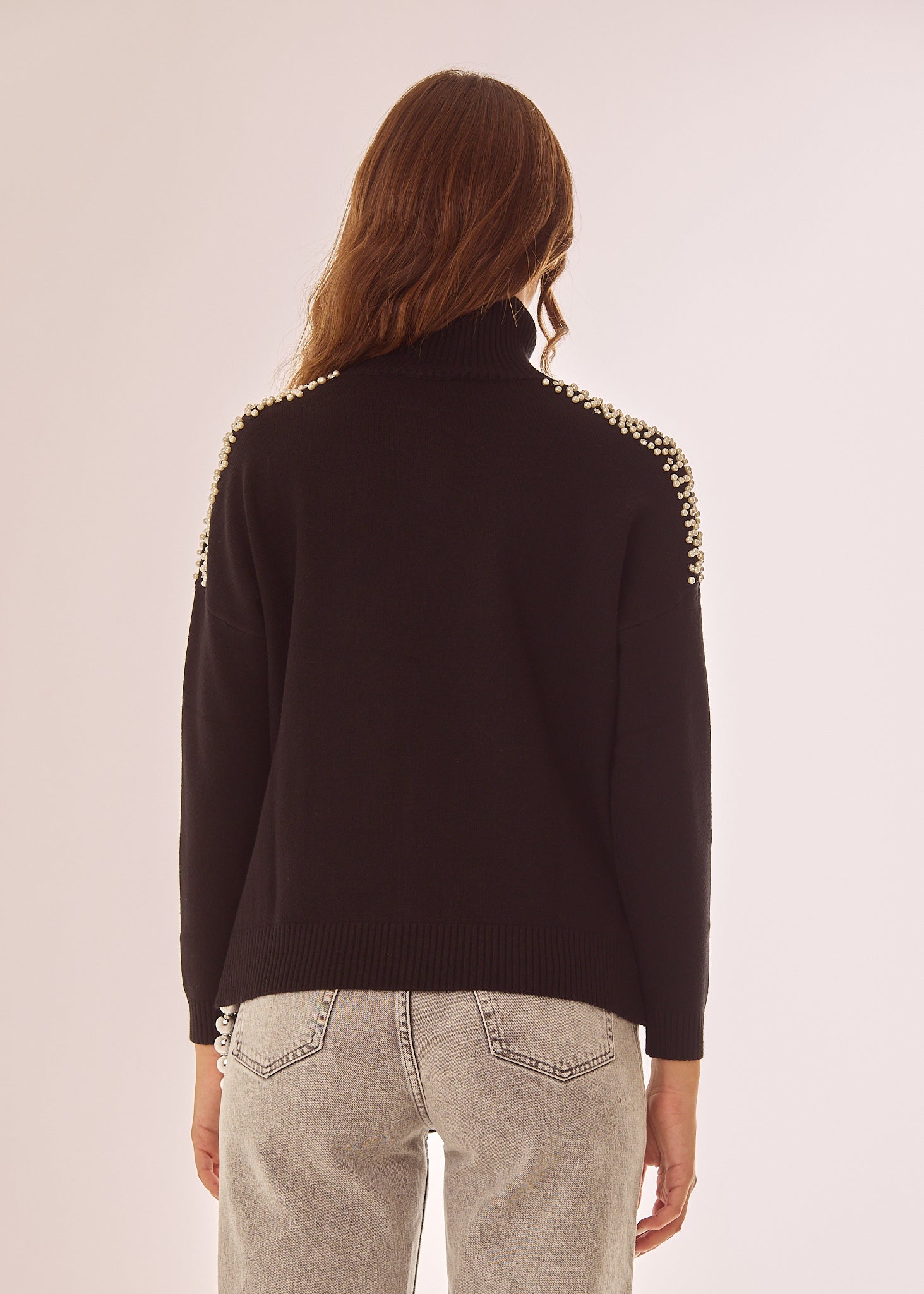 Maglia dolcevita con applicazioni