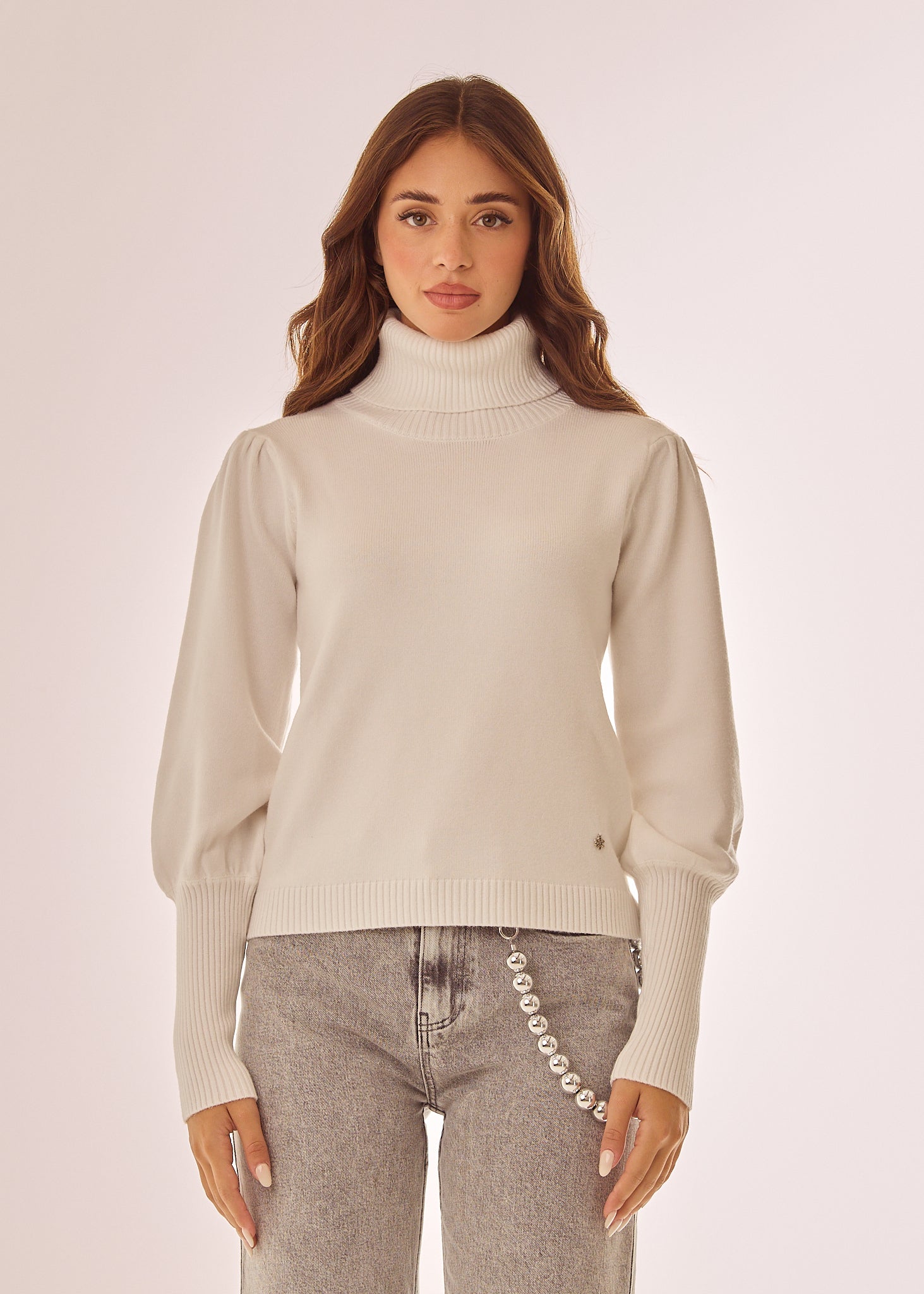 Maglia dolcevita con maniche lunghe a sbuffo