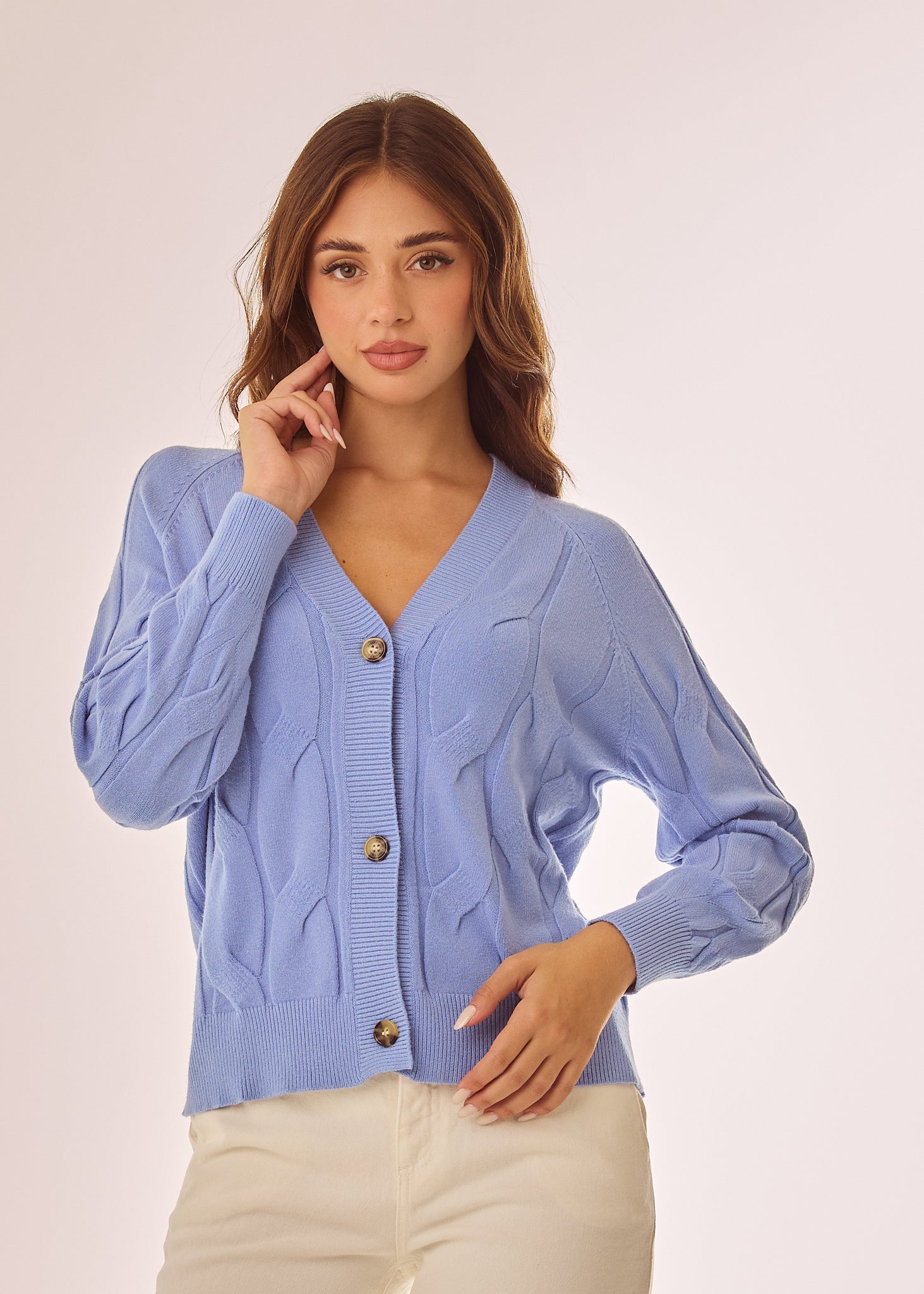 Cardigan con lavorazione a trecce