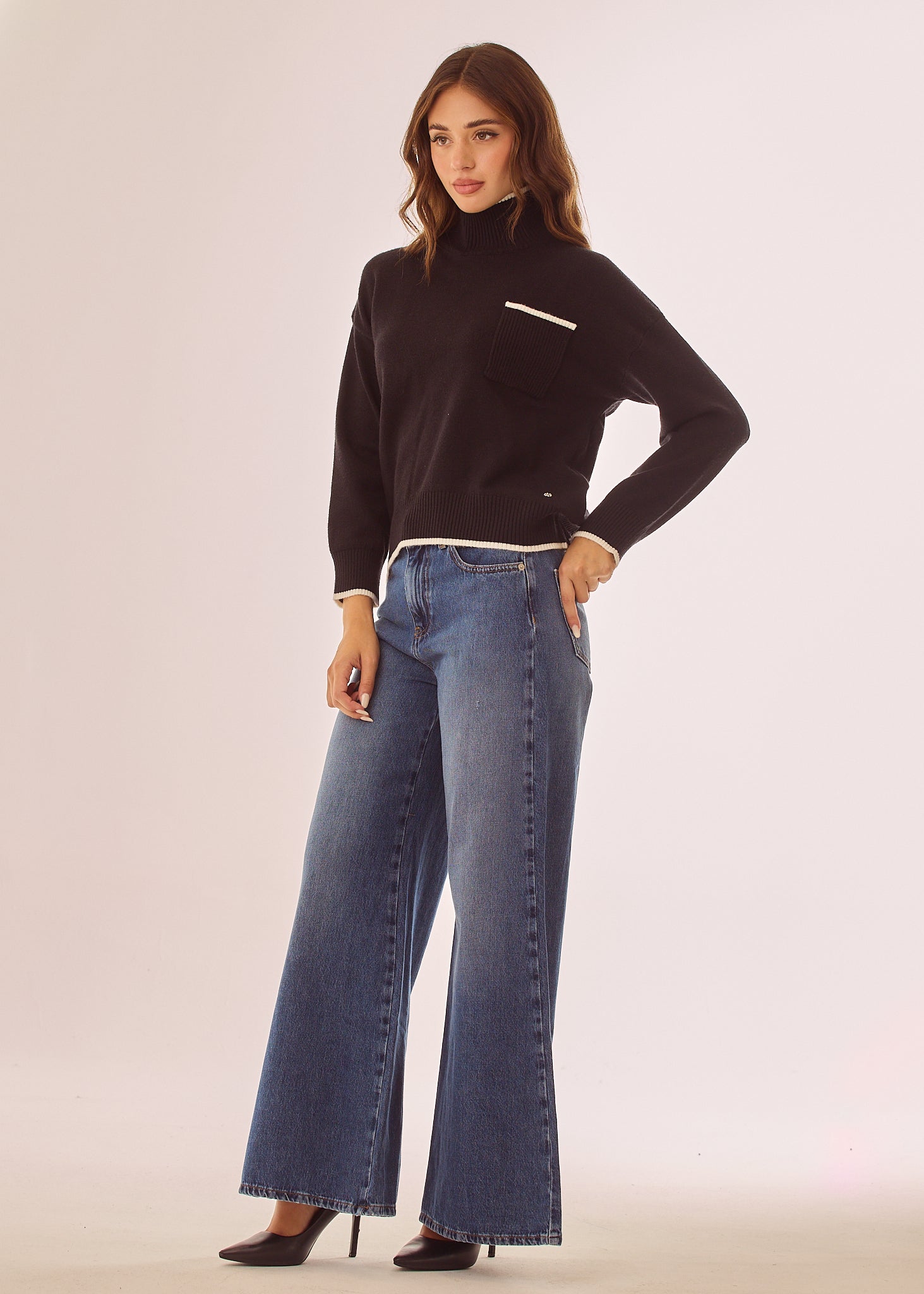 Maglia dolcevita con bordo a contrasto