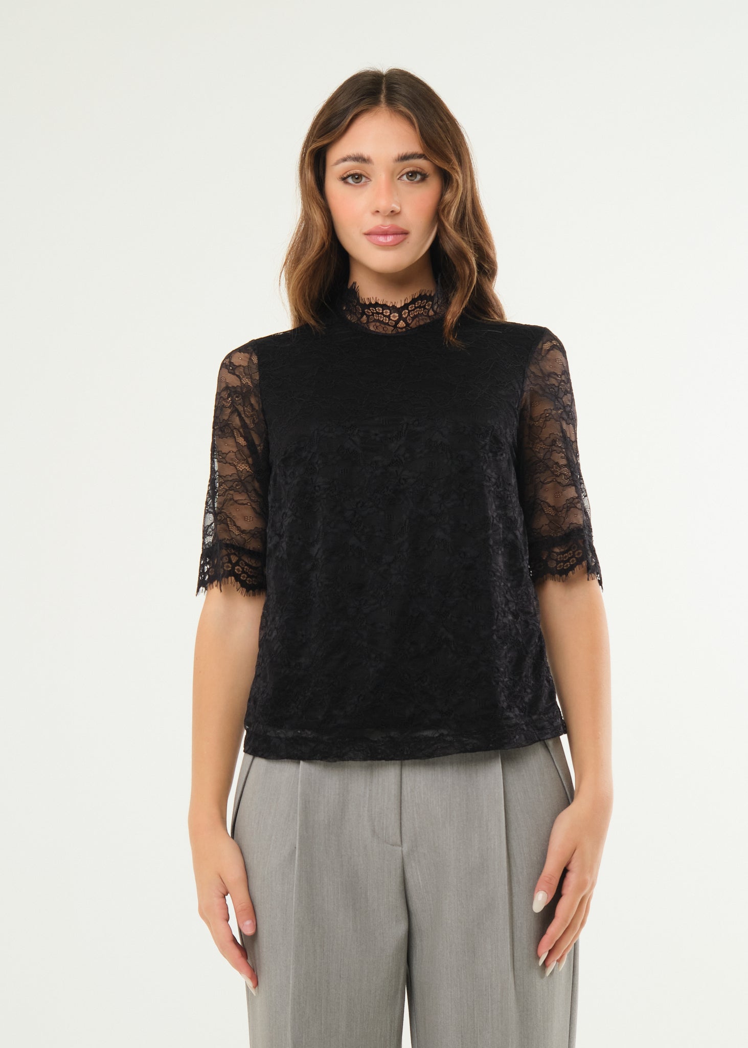 Maglia in pizzo elasticizzato