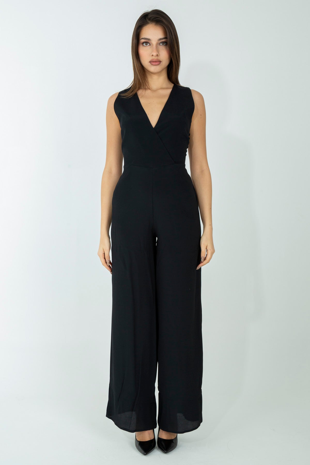 Tuta con arriccio posteriore