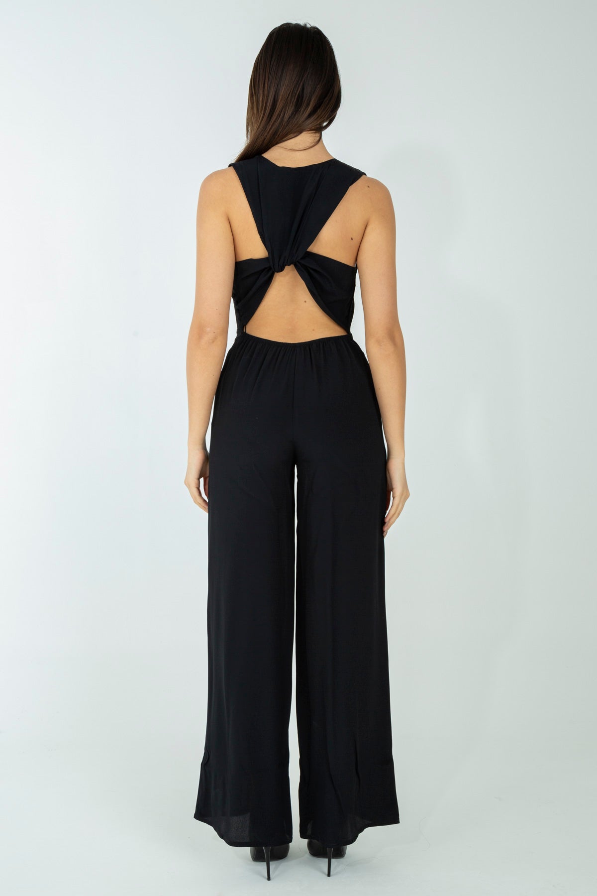 Tuta con arriccio posteriore