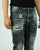 PATRIOT Jeans con rotture e macchie