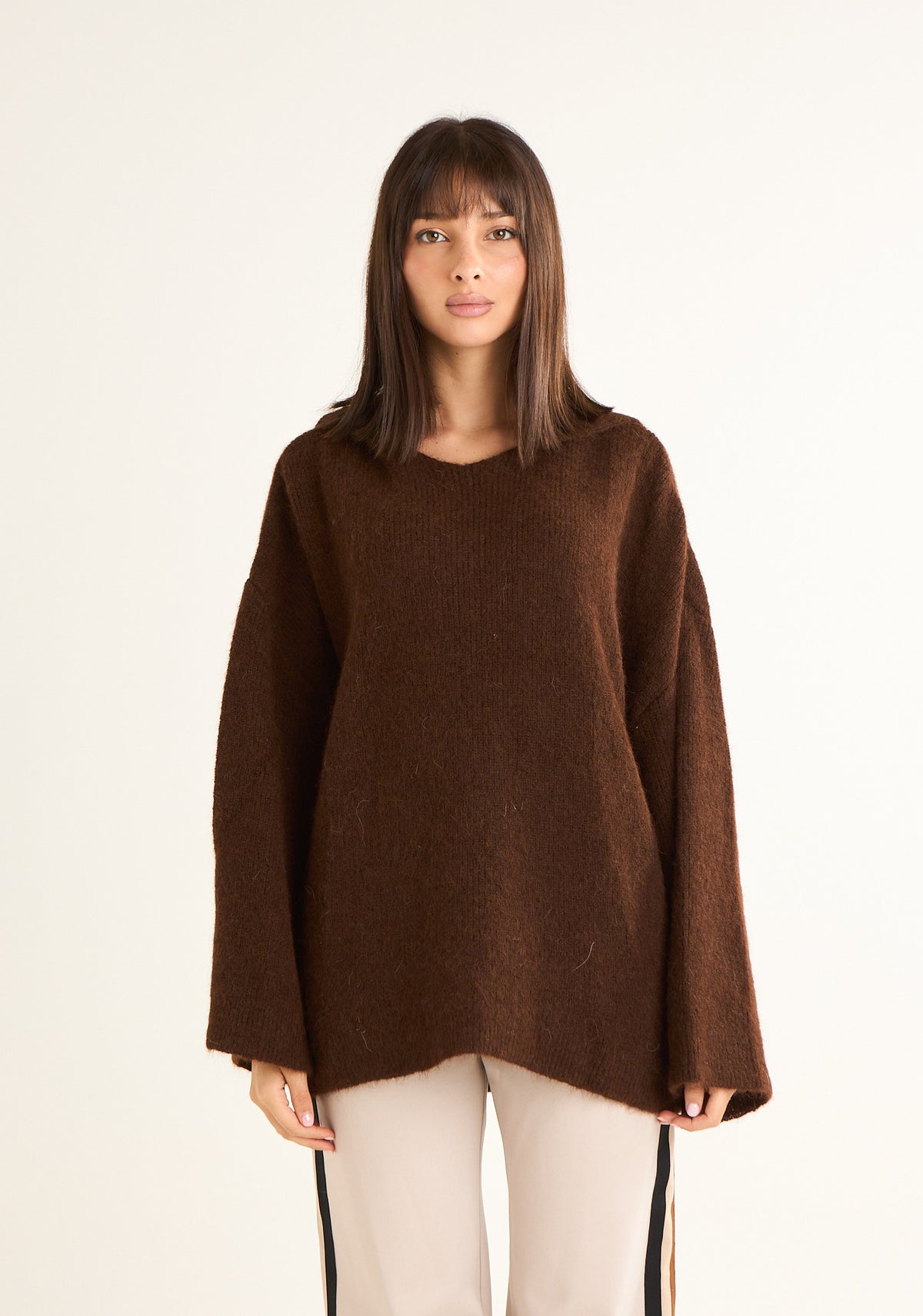 Maglia con cappuccio tinta unita