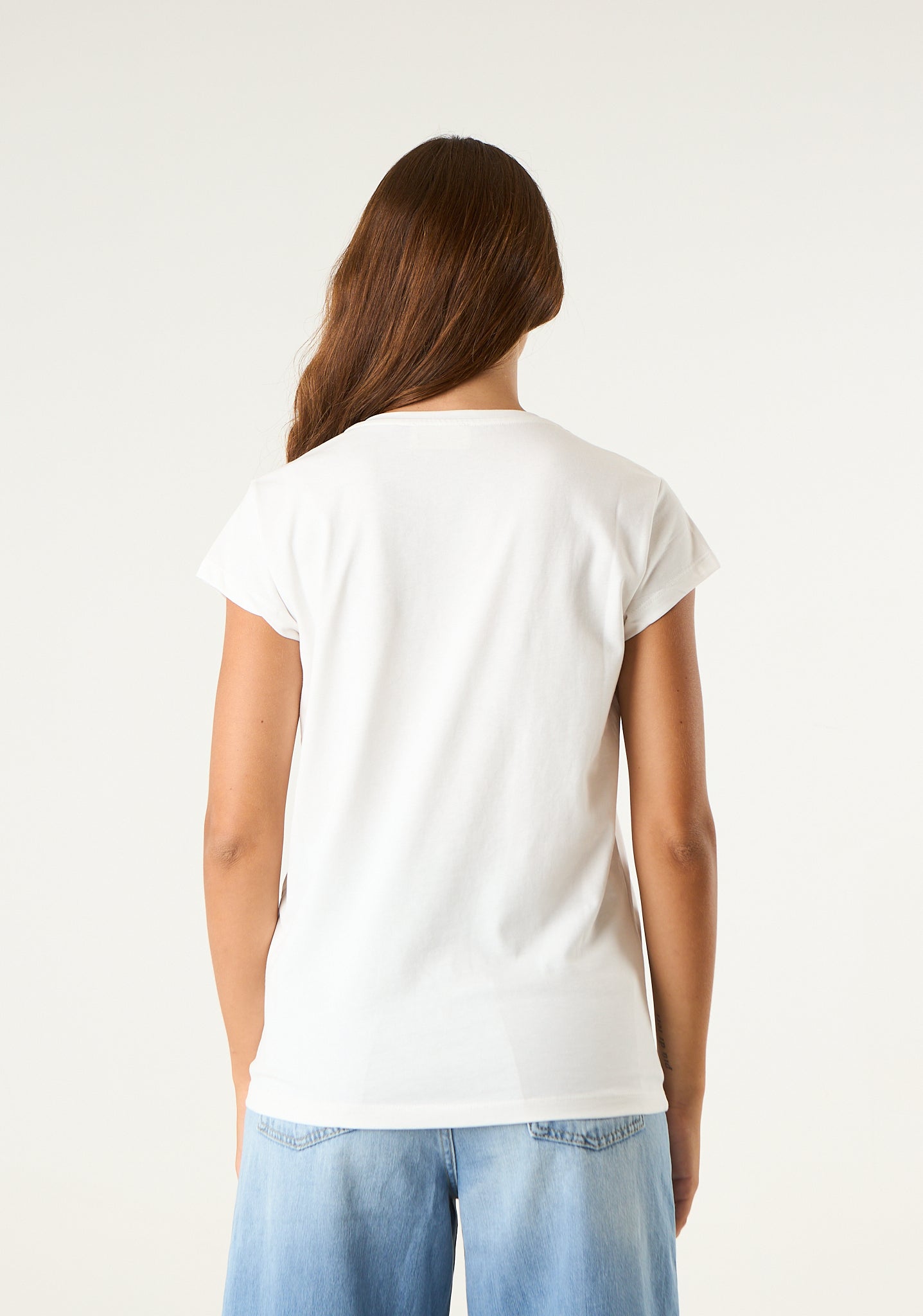T-shirt con stampa e applicazioni frontali