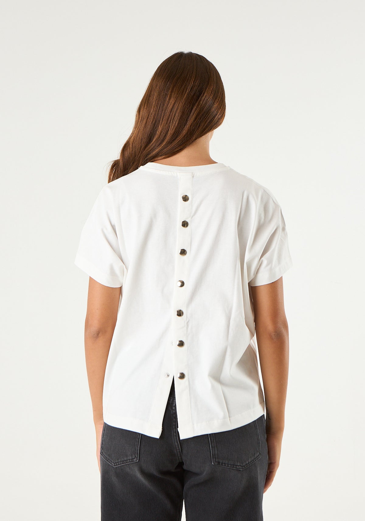T-shirt con apertura posteriore