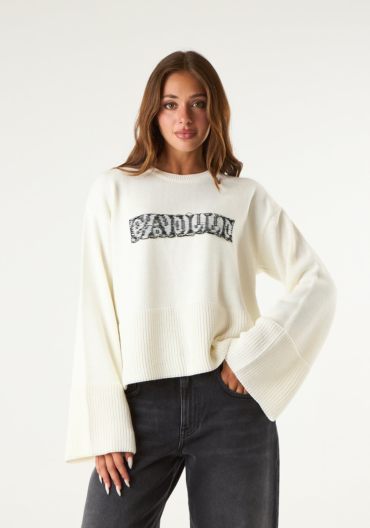 Pullover con maniche lunghe a campana