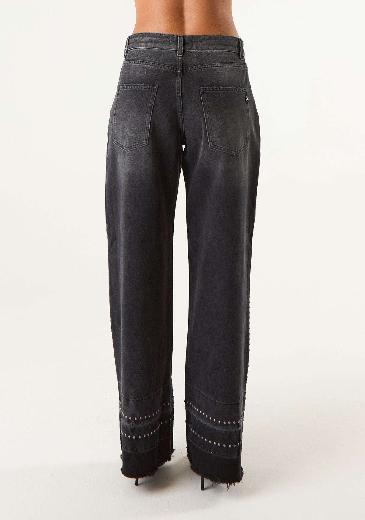 Jeans low waist con fondo scucito