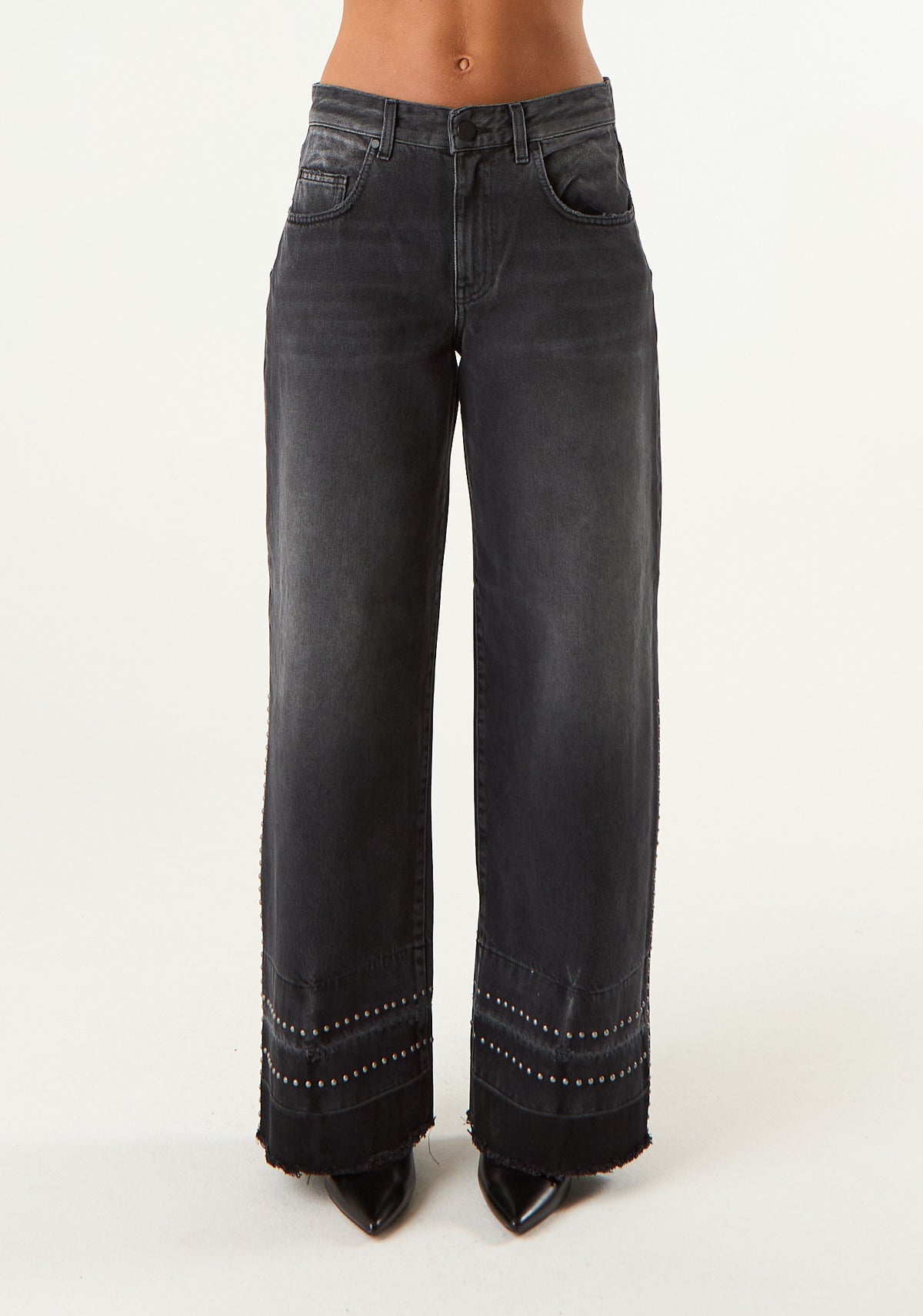 Jeans low waist con fondo scucito
