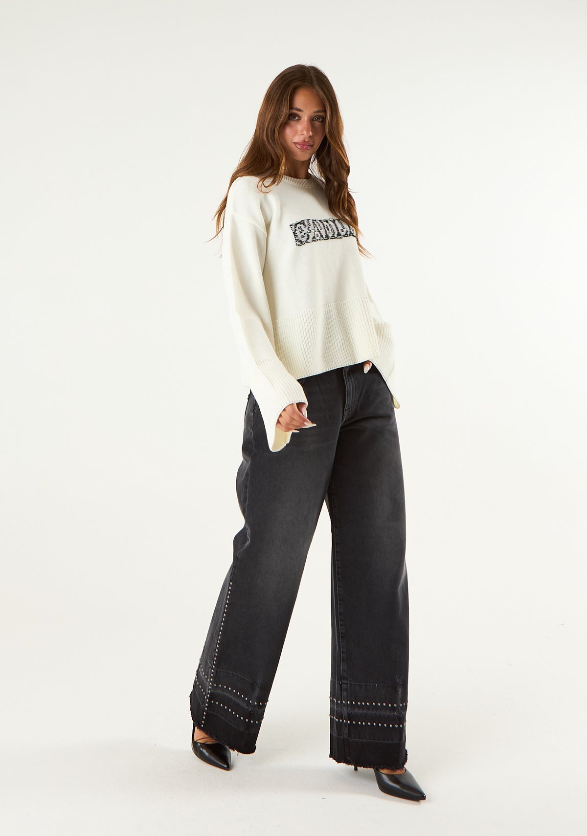 Jeans low waist con fondo scucito
