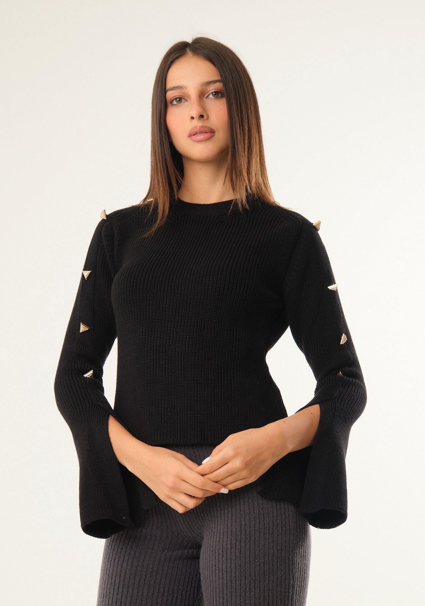 Maglia con maniche a campana aperte