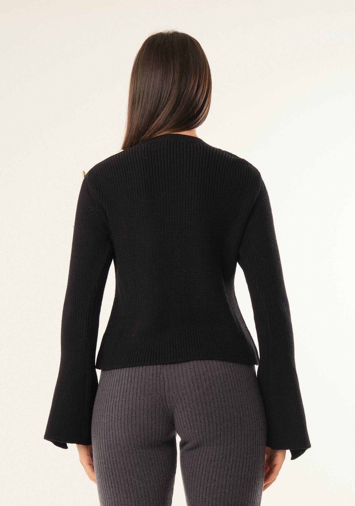Maglia con maniche a campana aperte