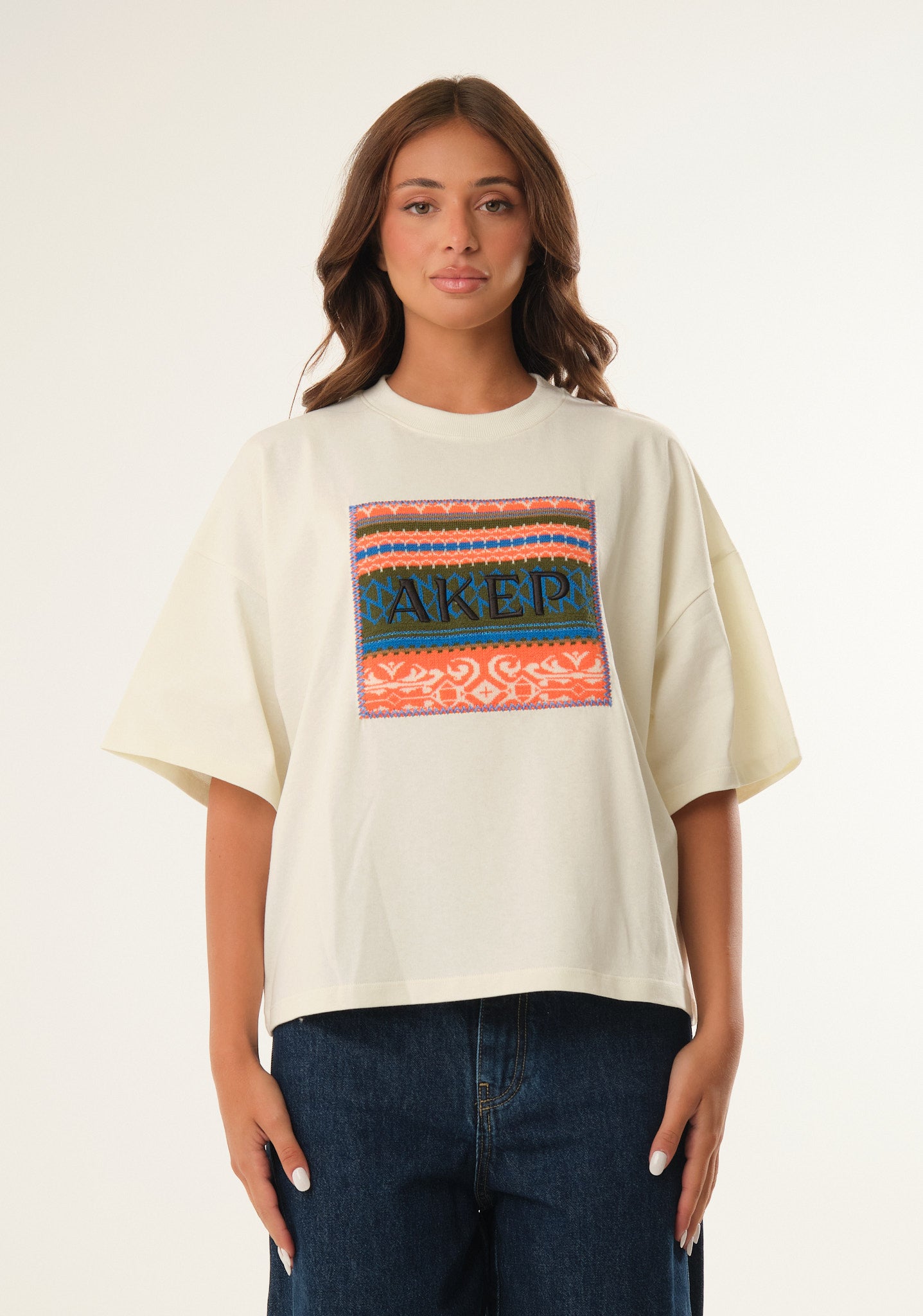 T-shirt con patch logato