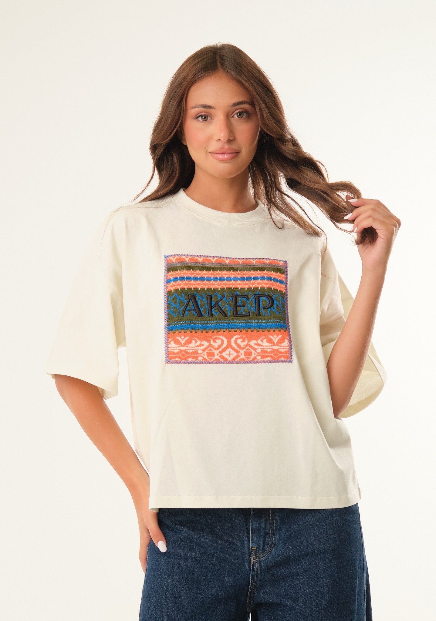 T-shirt con patch logato