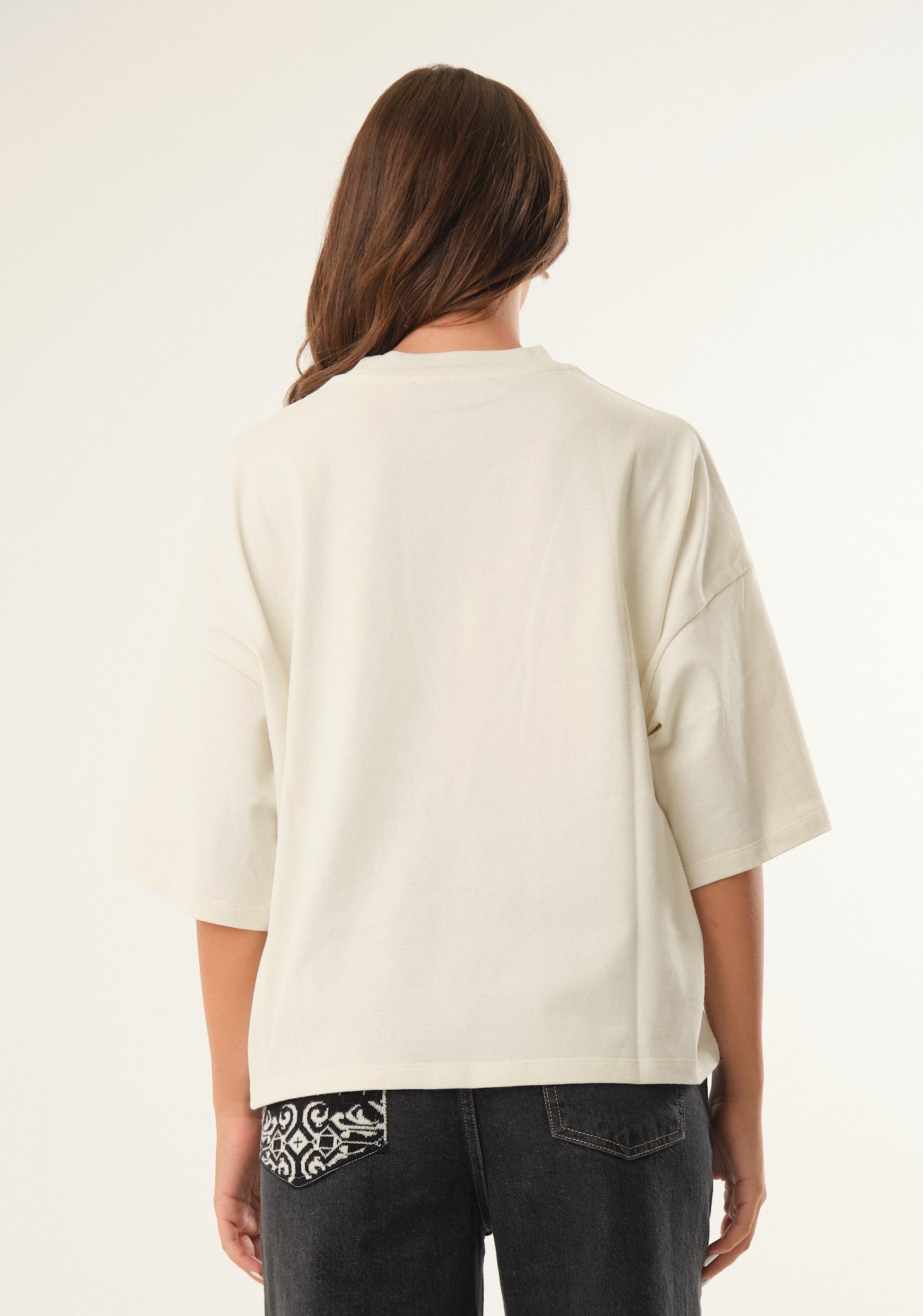 T-shirt con ricamo laterale