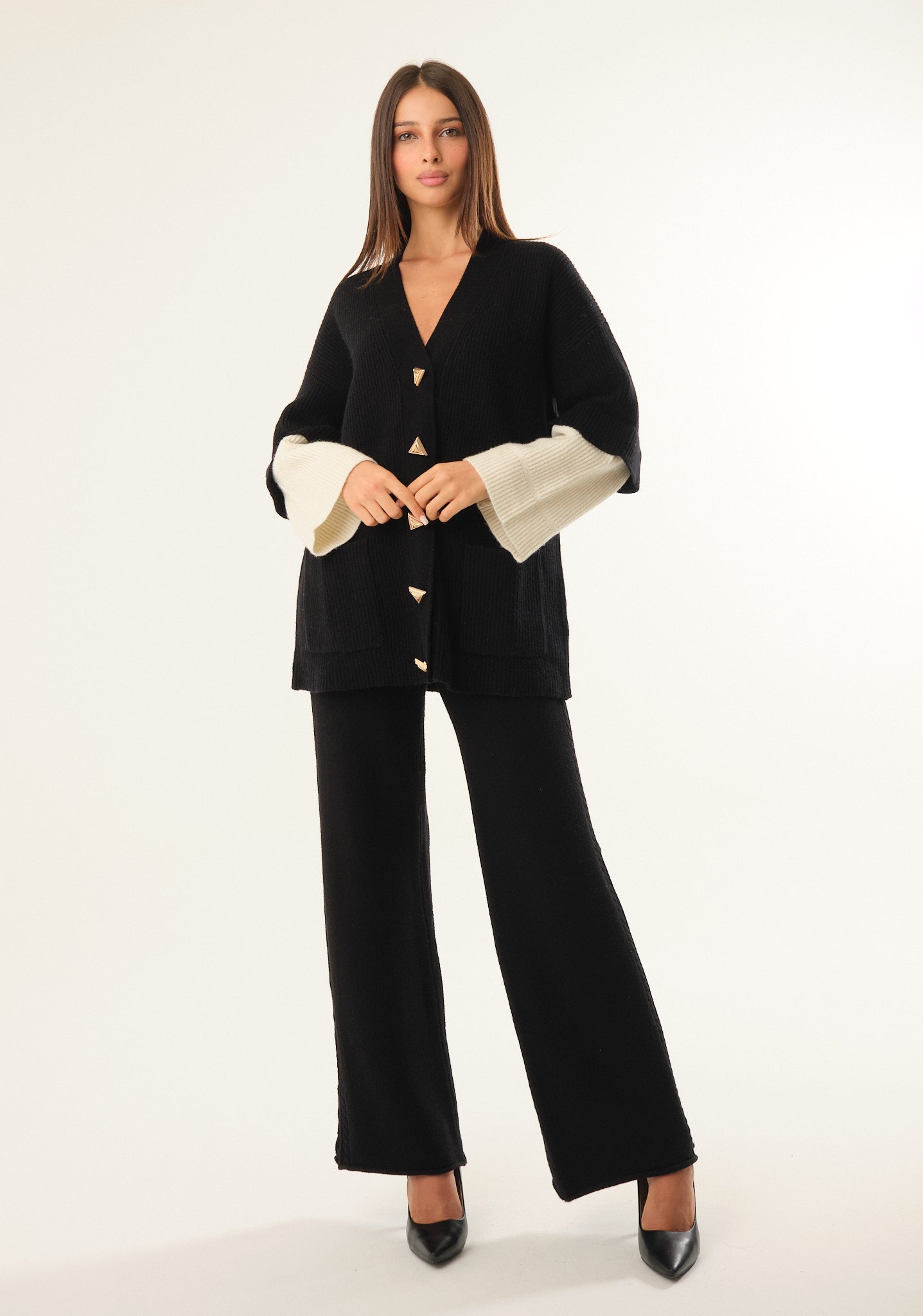 Pantalone palazzo con dettaglio laterale