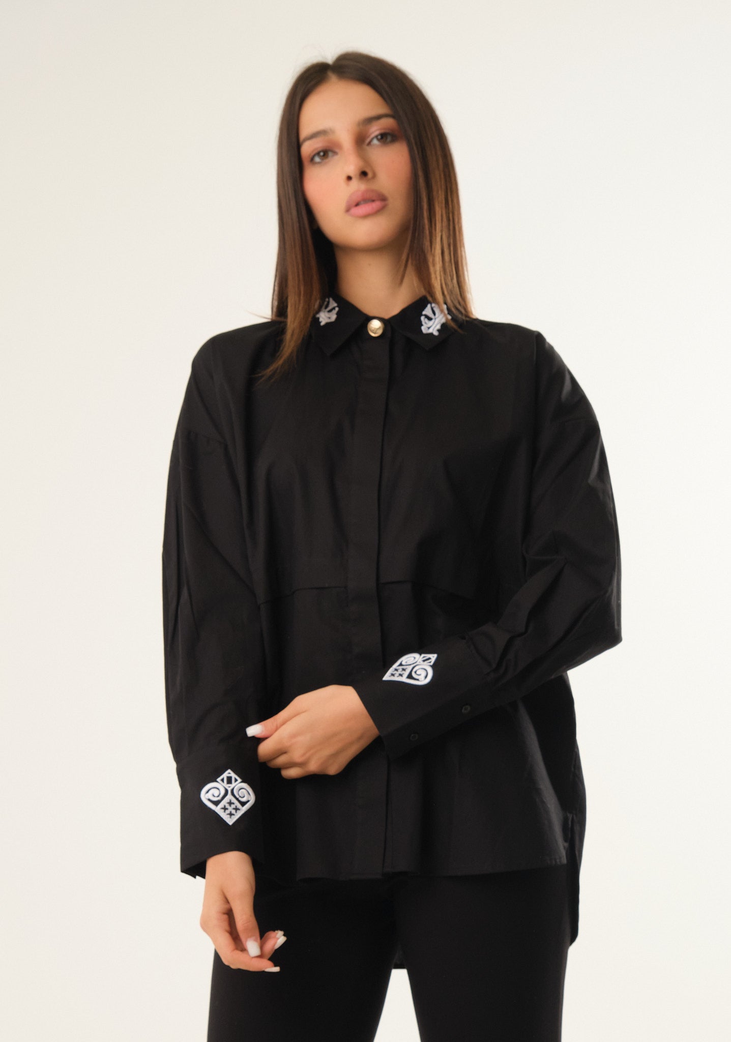 Camicia over con rivetto al centro
