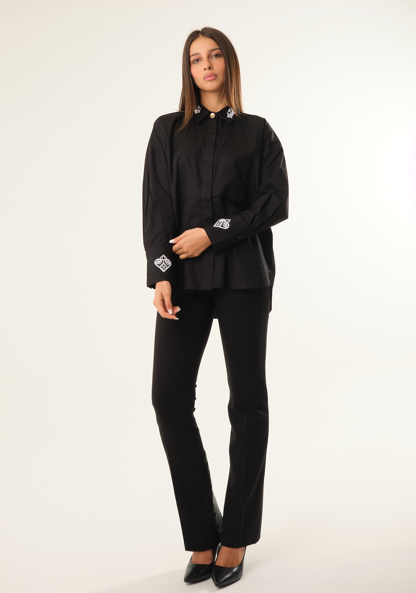 Camicia over con rivetto al centro