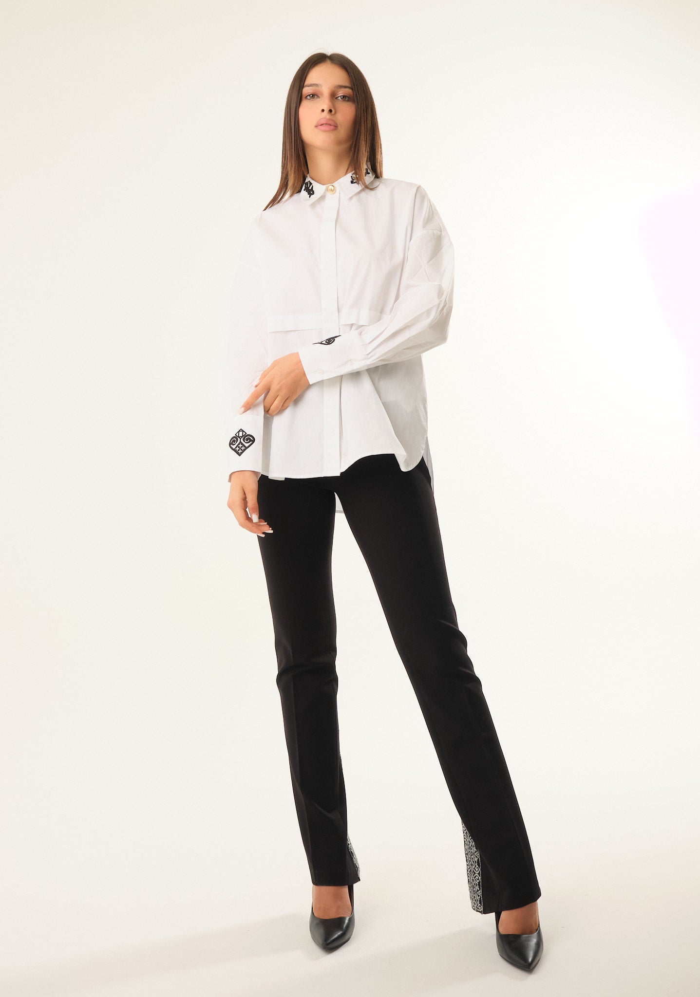 Camicia over con rivetto al centro