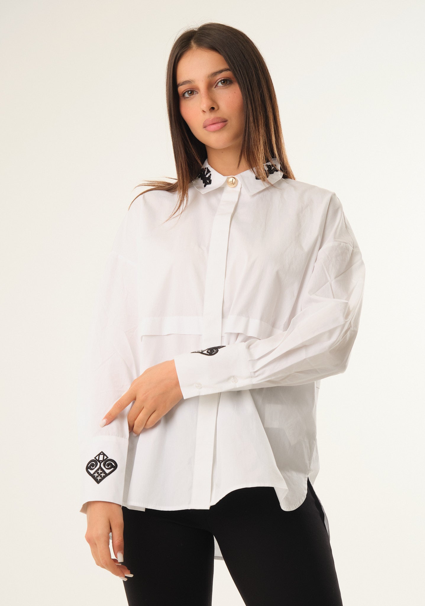 Camicia over con rivetto al centro