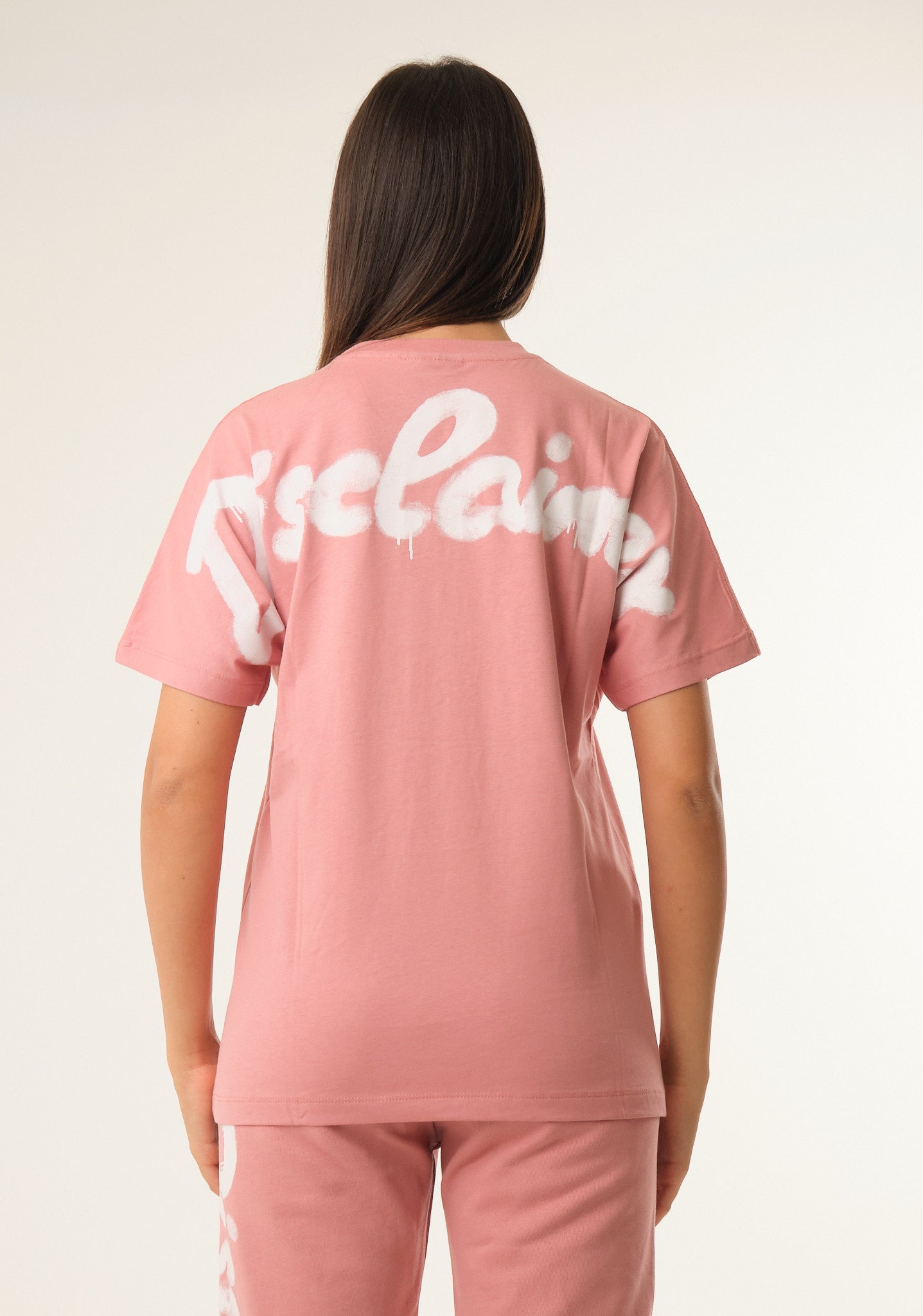 T-shirt con stampa posteriore spray