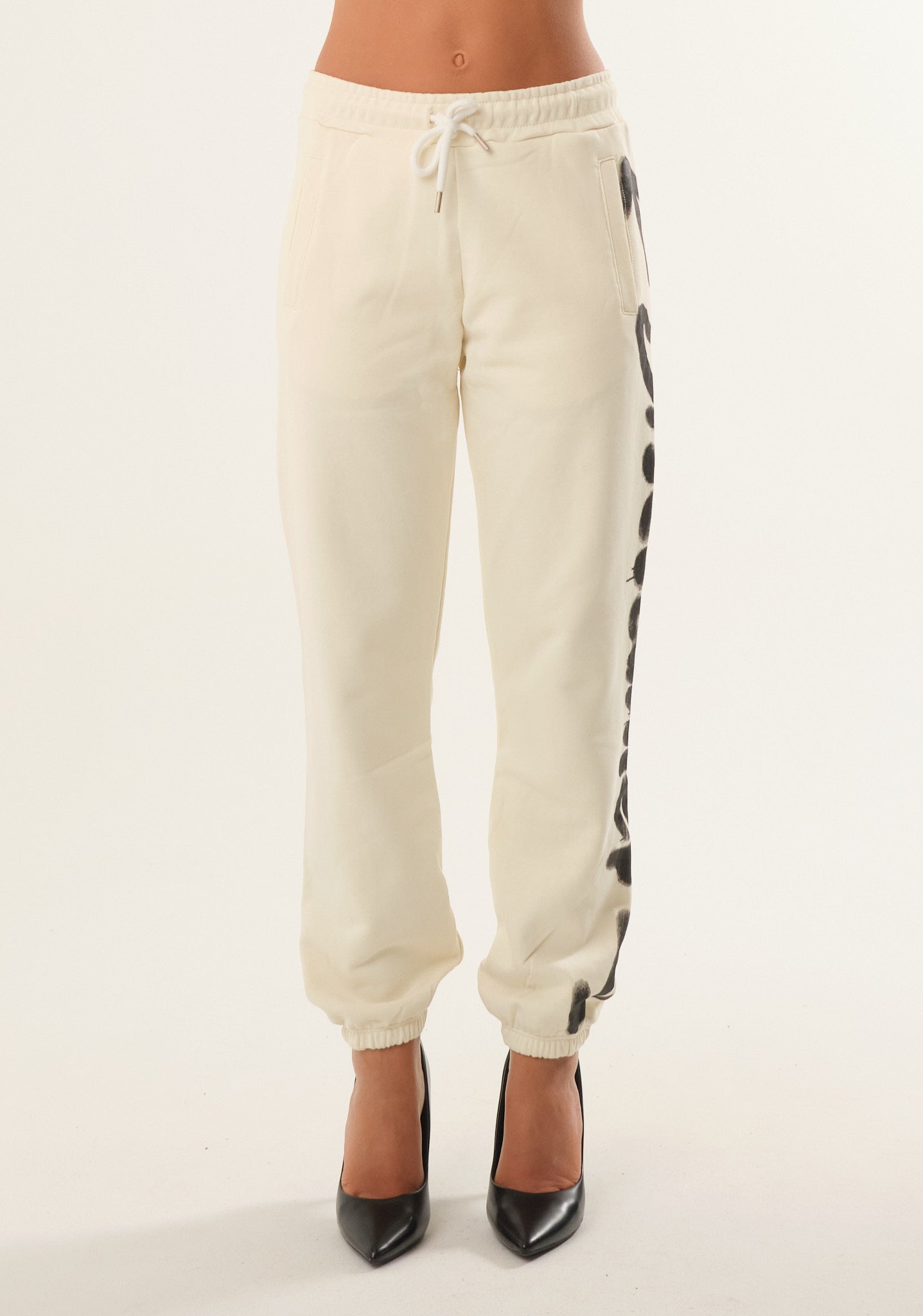 Pantalone con stampa spray laterale