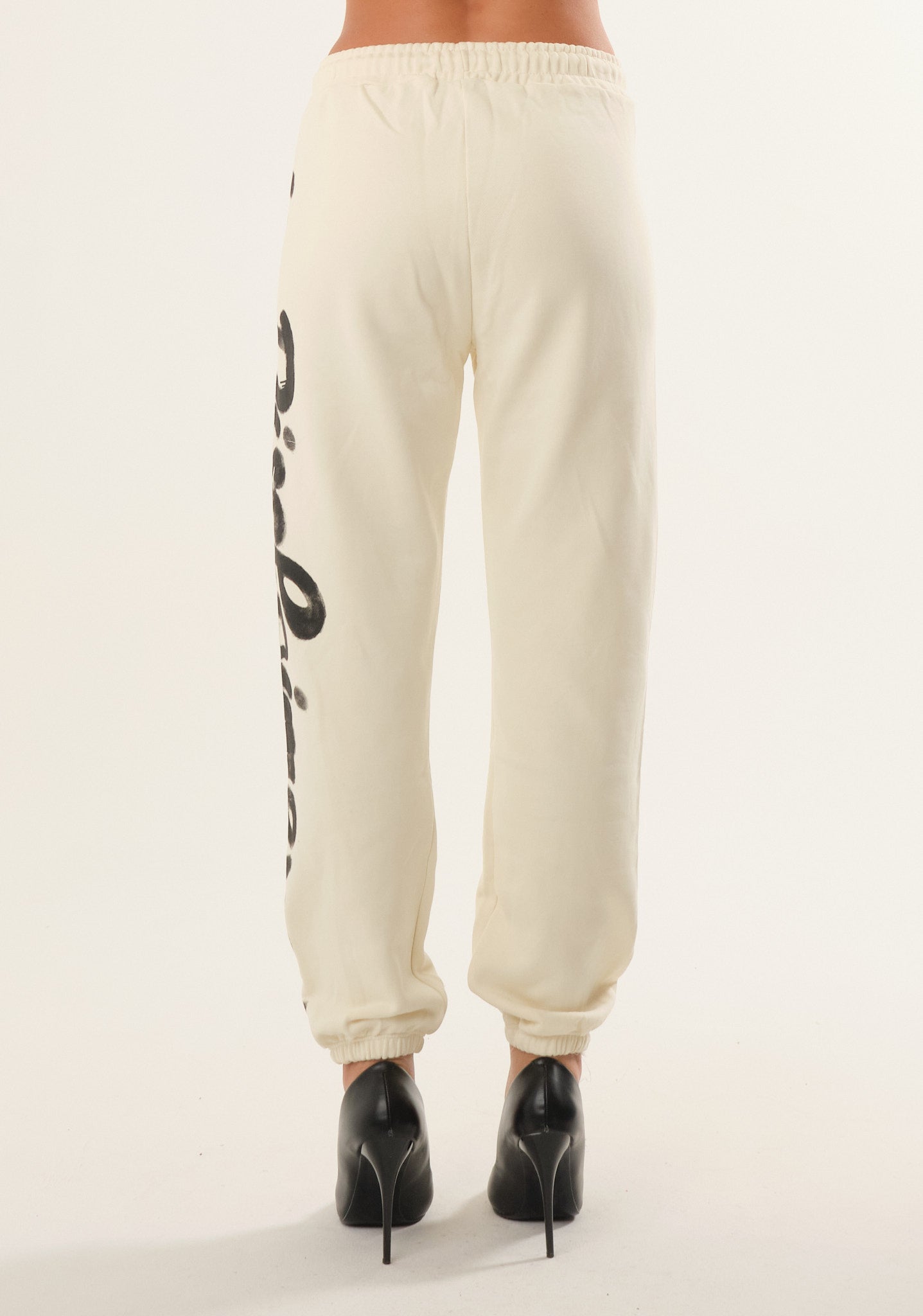Pantalone con stampa spray laterale