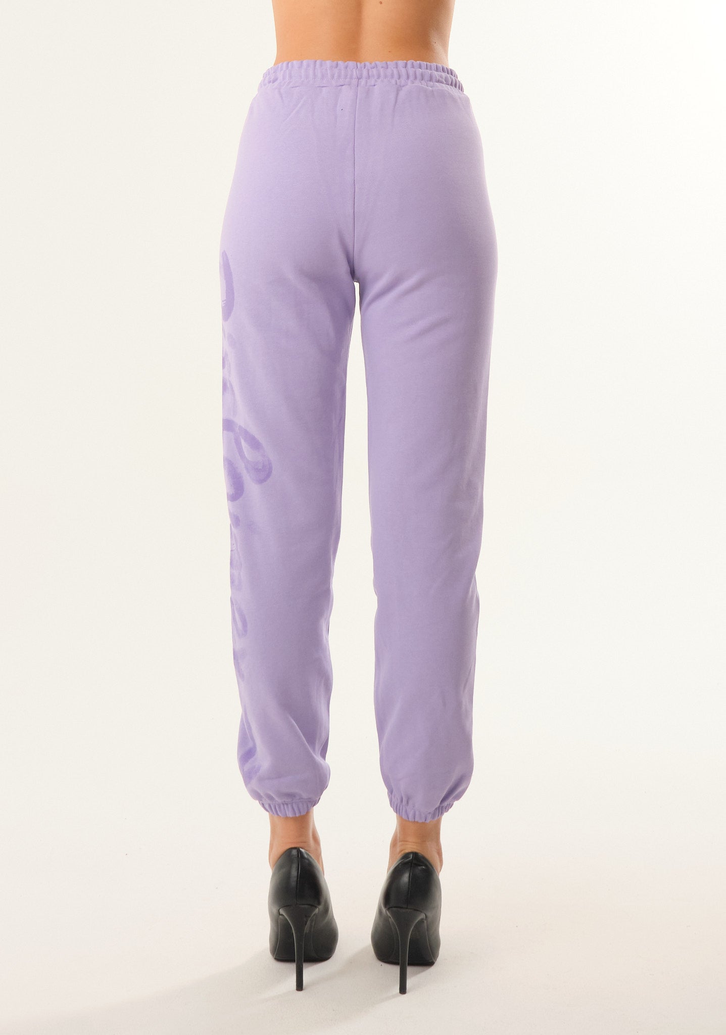 Pantalone con stampa spray laterale