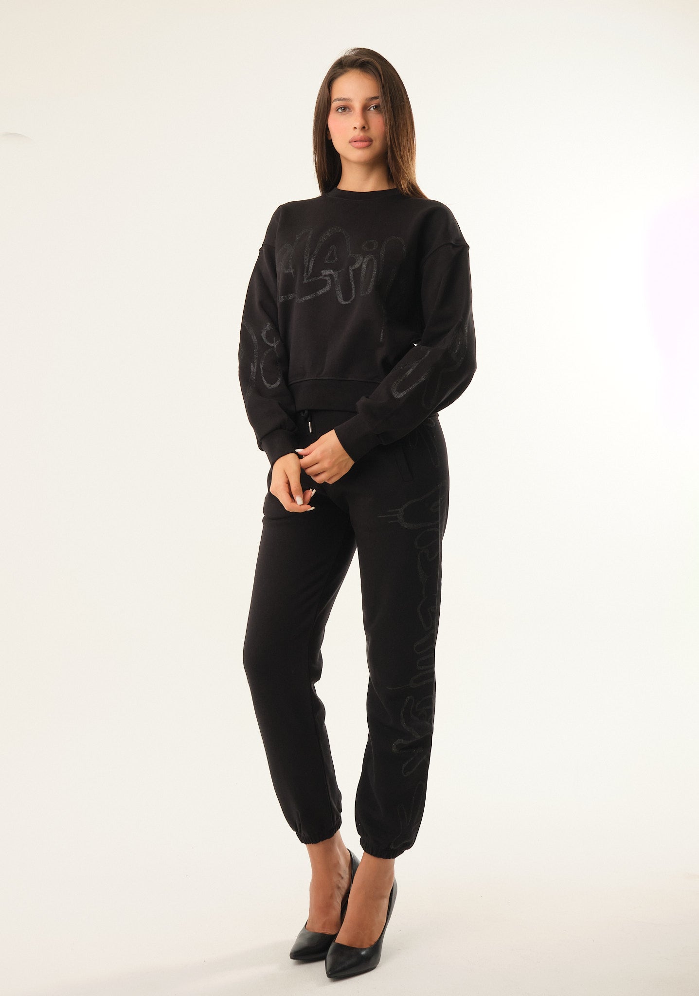 Pantalone con stampa lurex