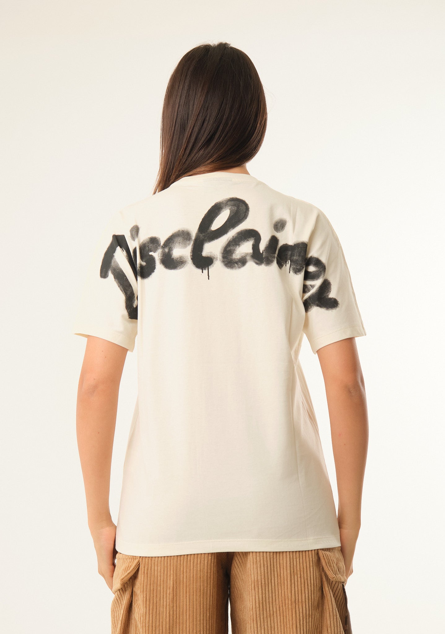 T-shirt con stampa posteriore spray
