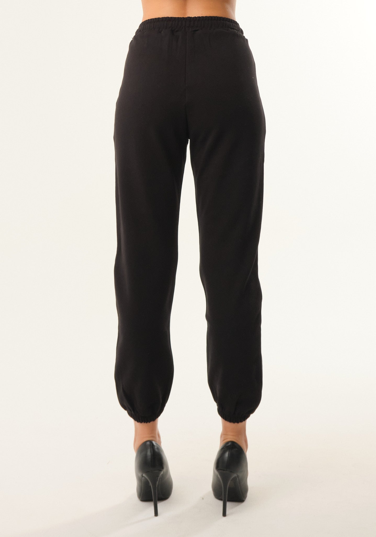 Pantalone tuta con stampa su fondo gamba