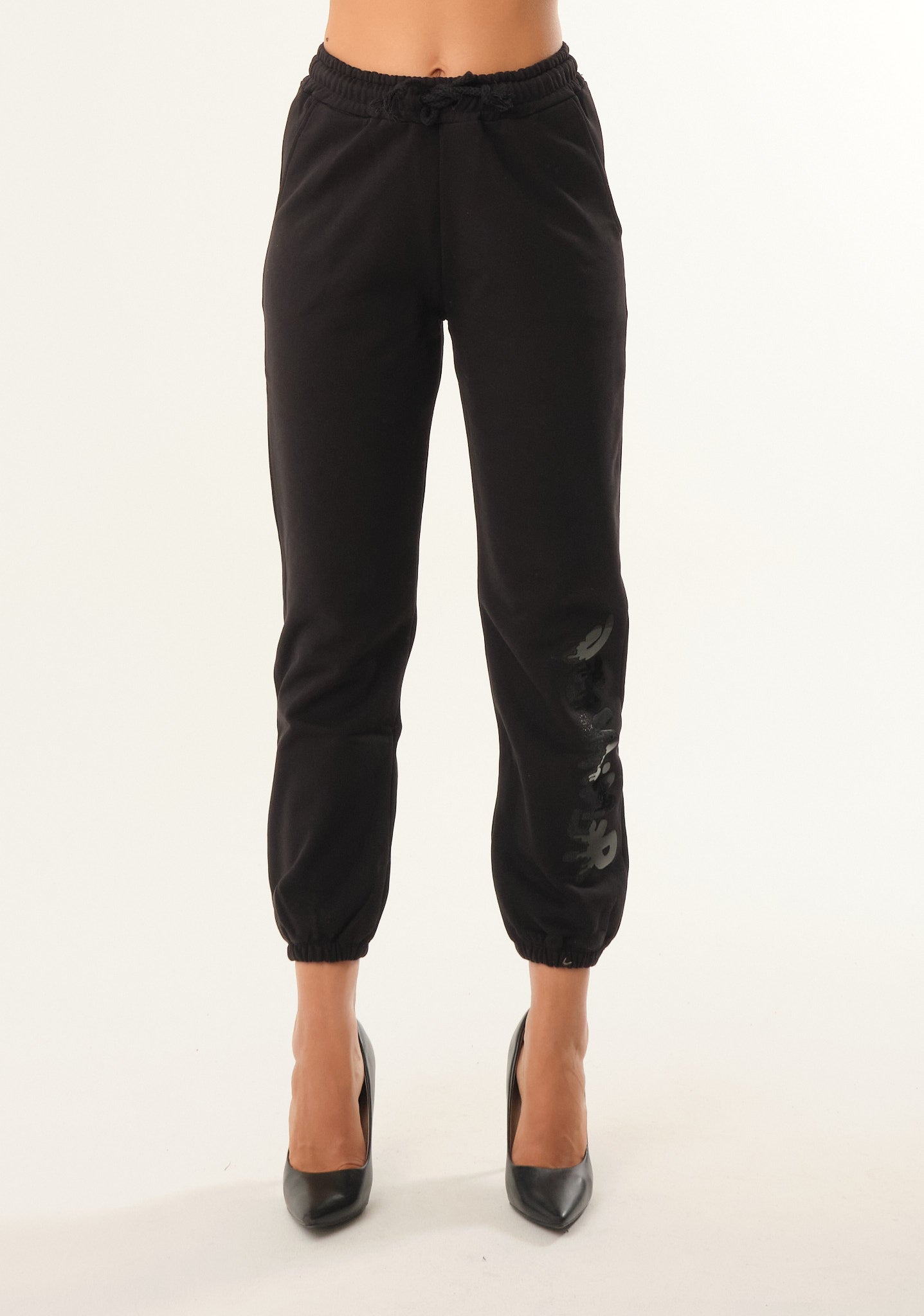 Pantalone tuta con stampa su fondo gamba
