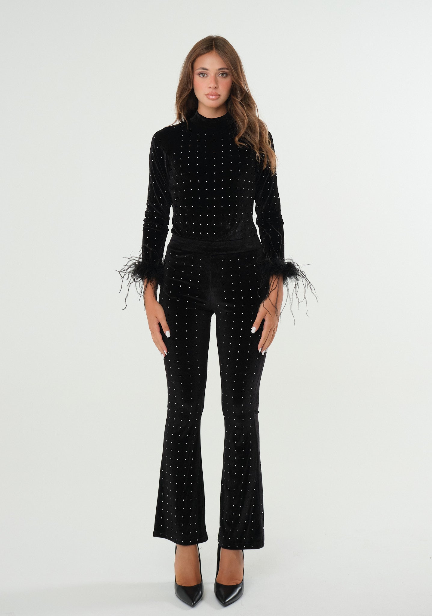 Pantaloni con applicazioni