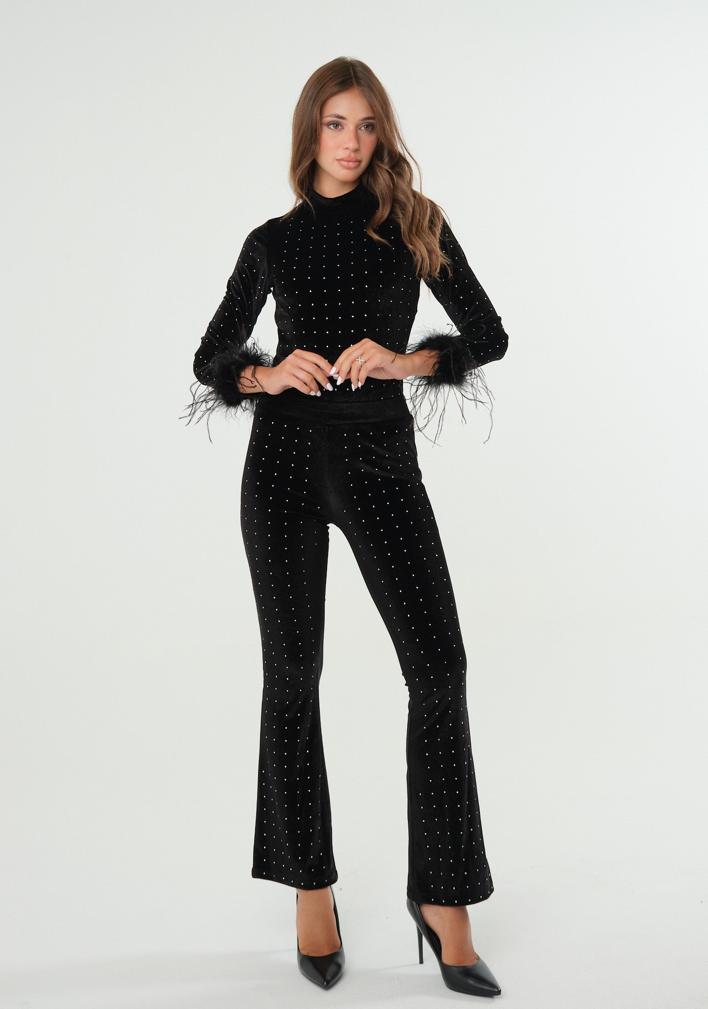 Pantaloni con applicazioni