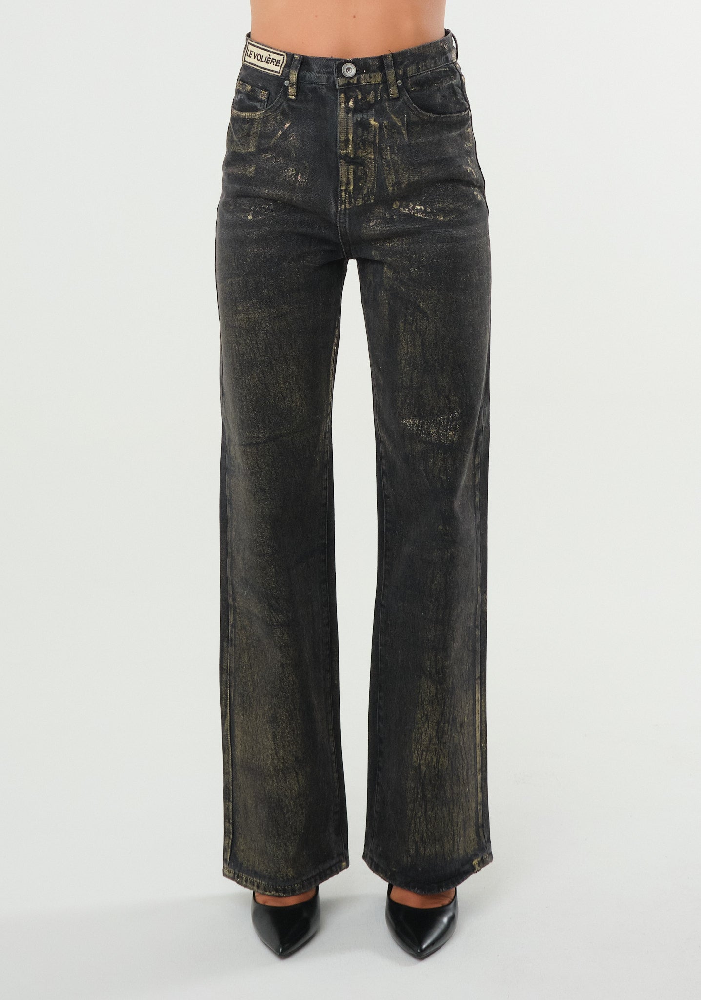 Jeans con spalmatura metal