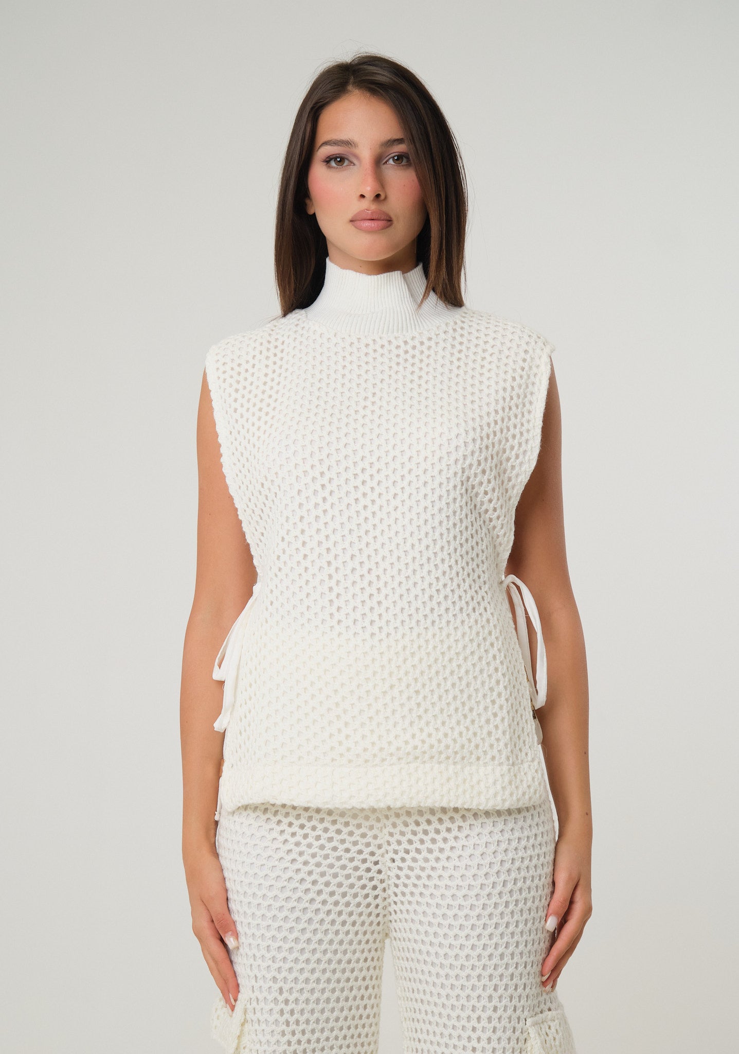 Maglia smanicata in rete
