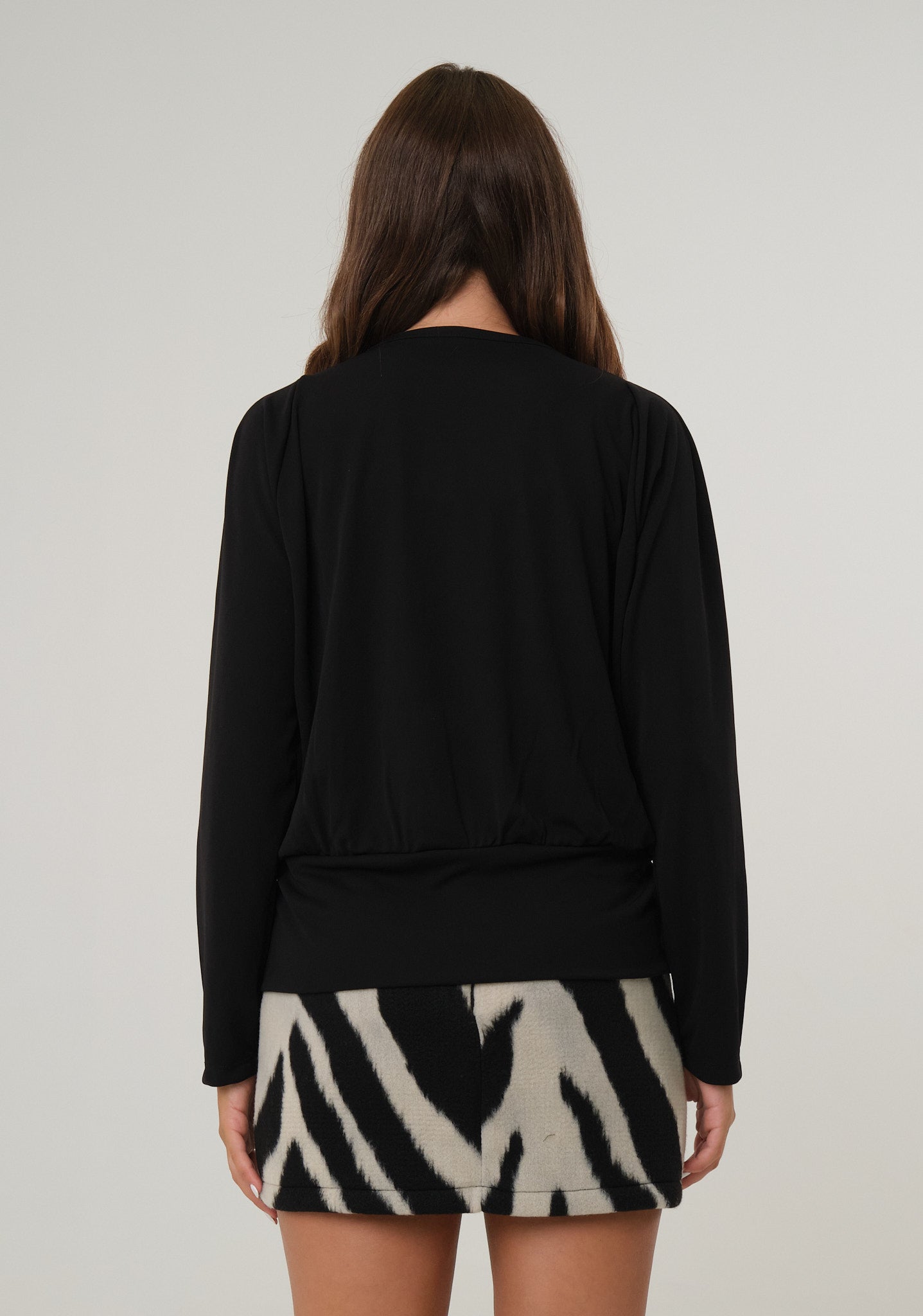 Blusa in tessuto stretch
