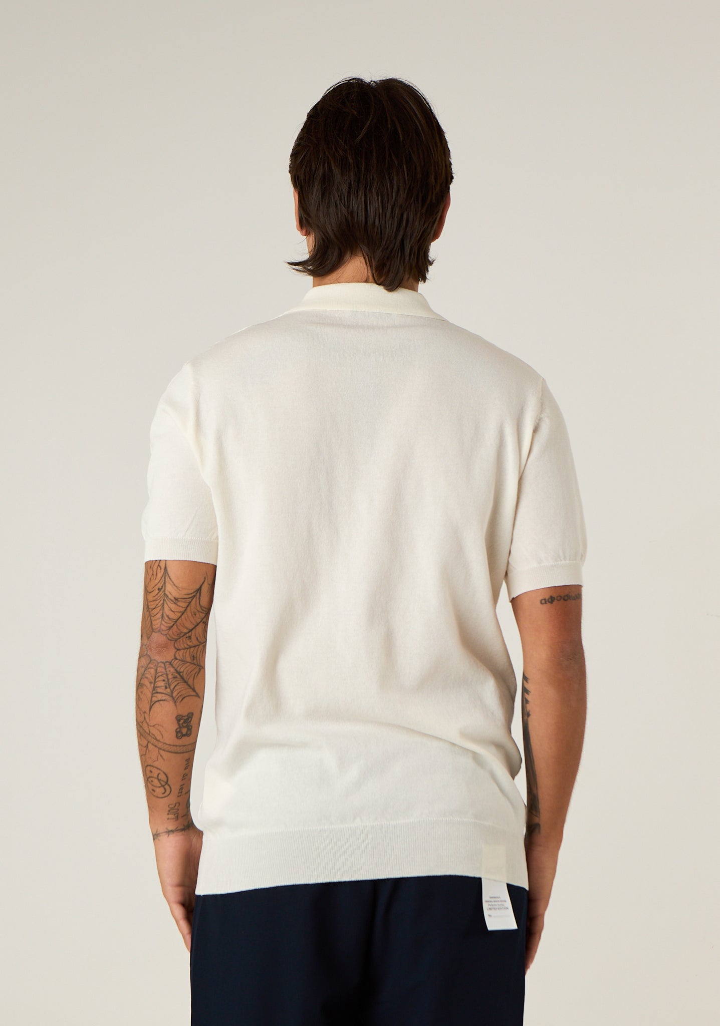Polo in maglia lavorata