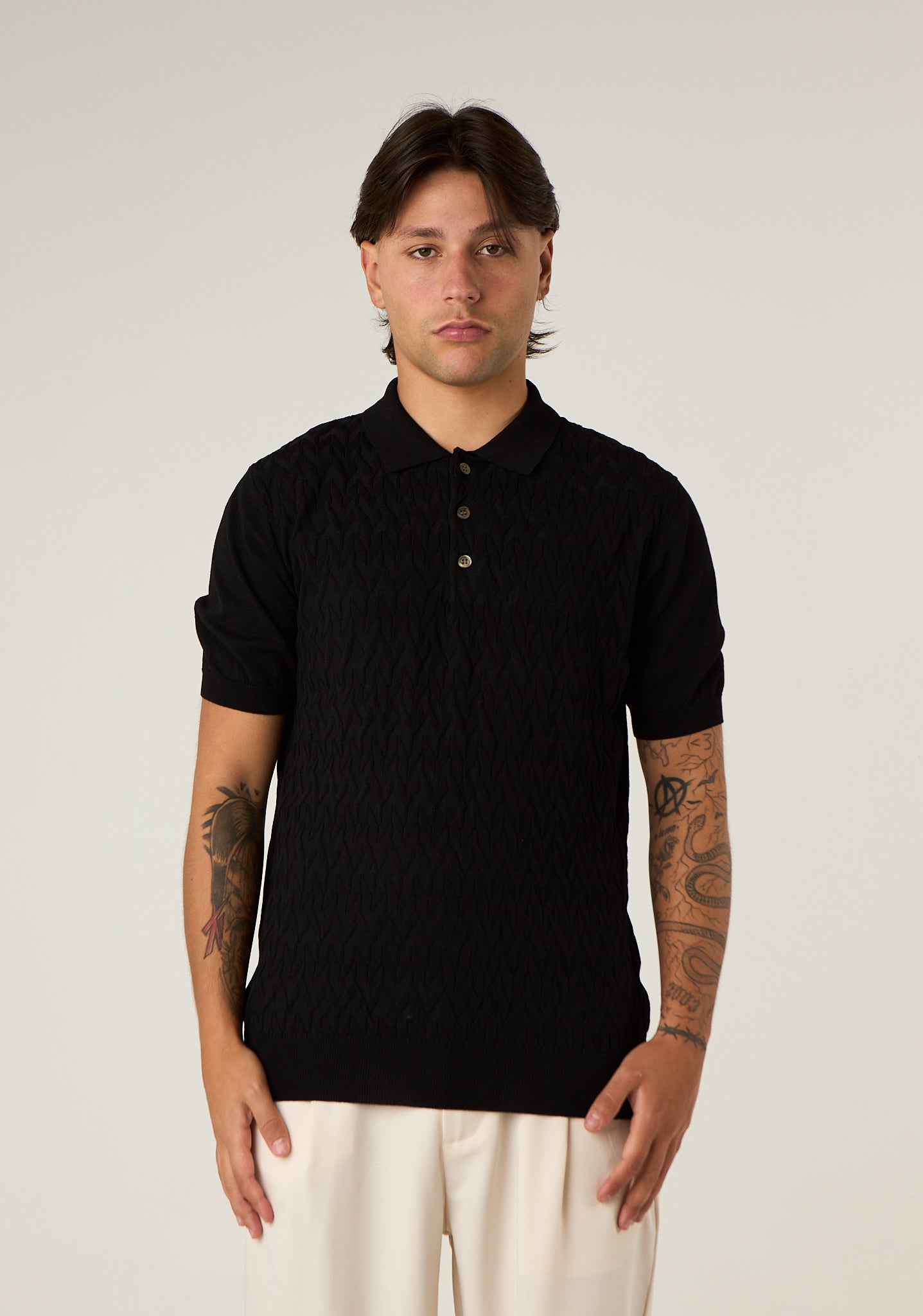 Polo in maglia lavorata