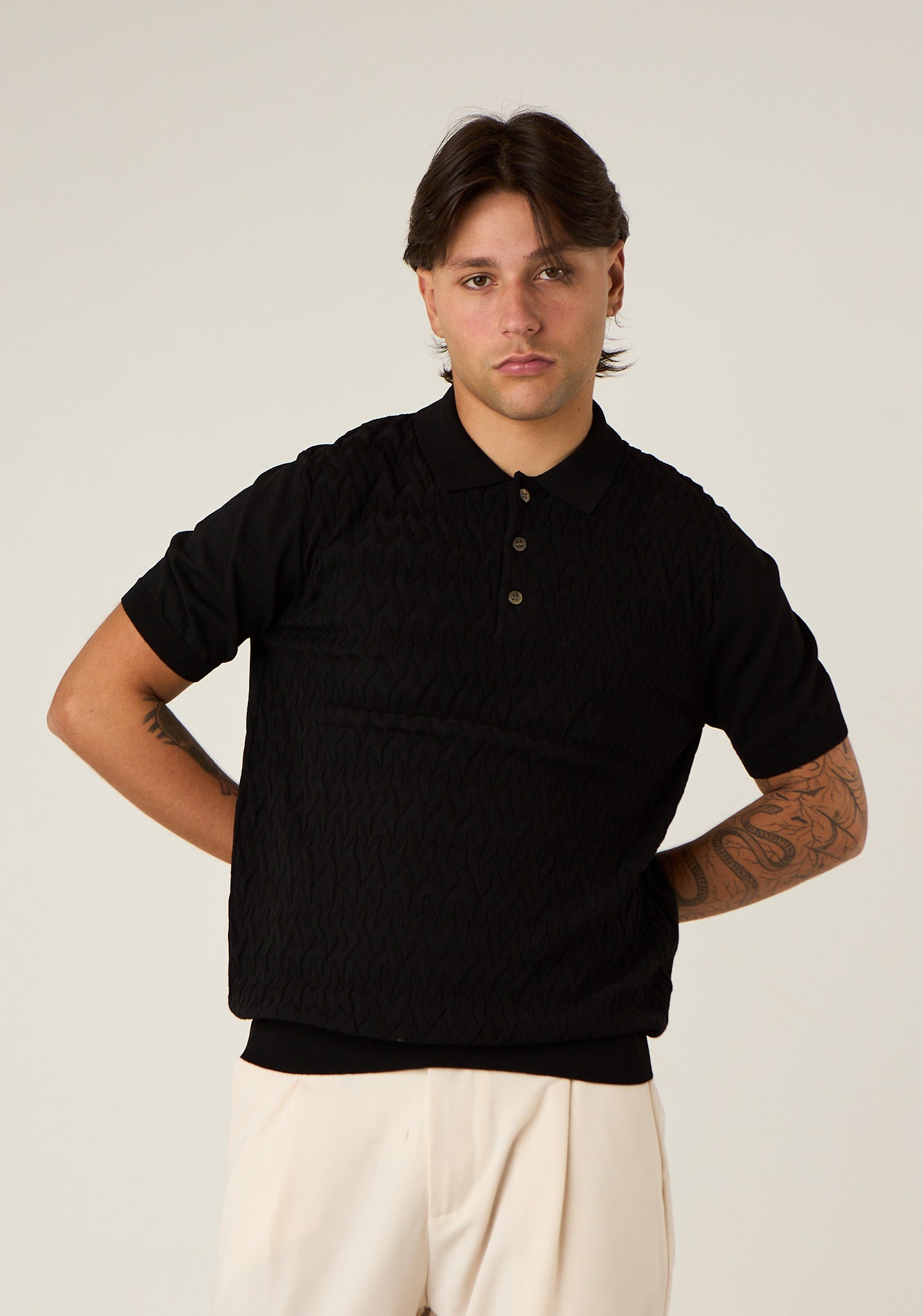 Polo in maglia lavorata