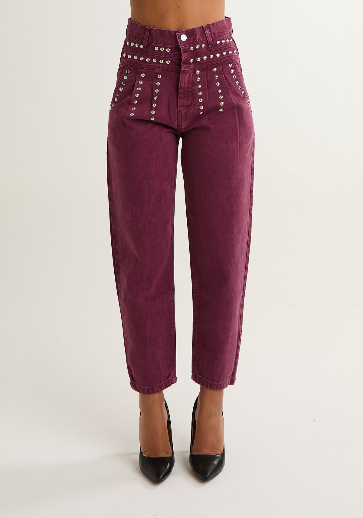 Jeans con borchie