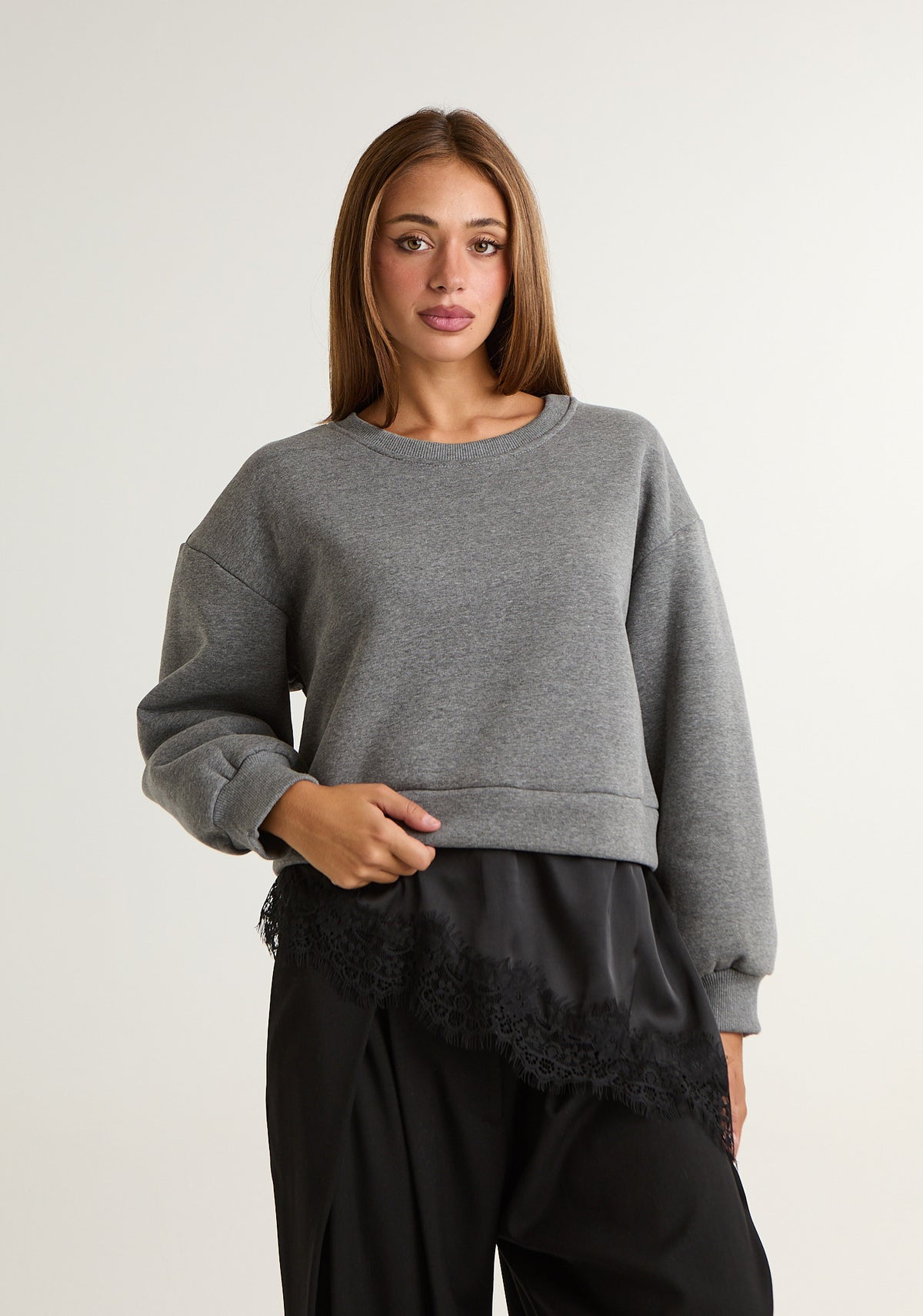 Felpa asimmetrica con pizzo